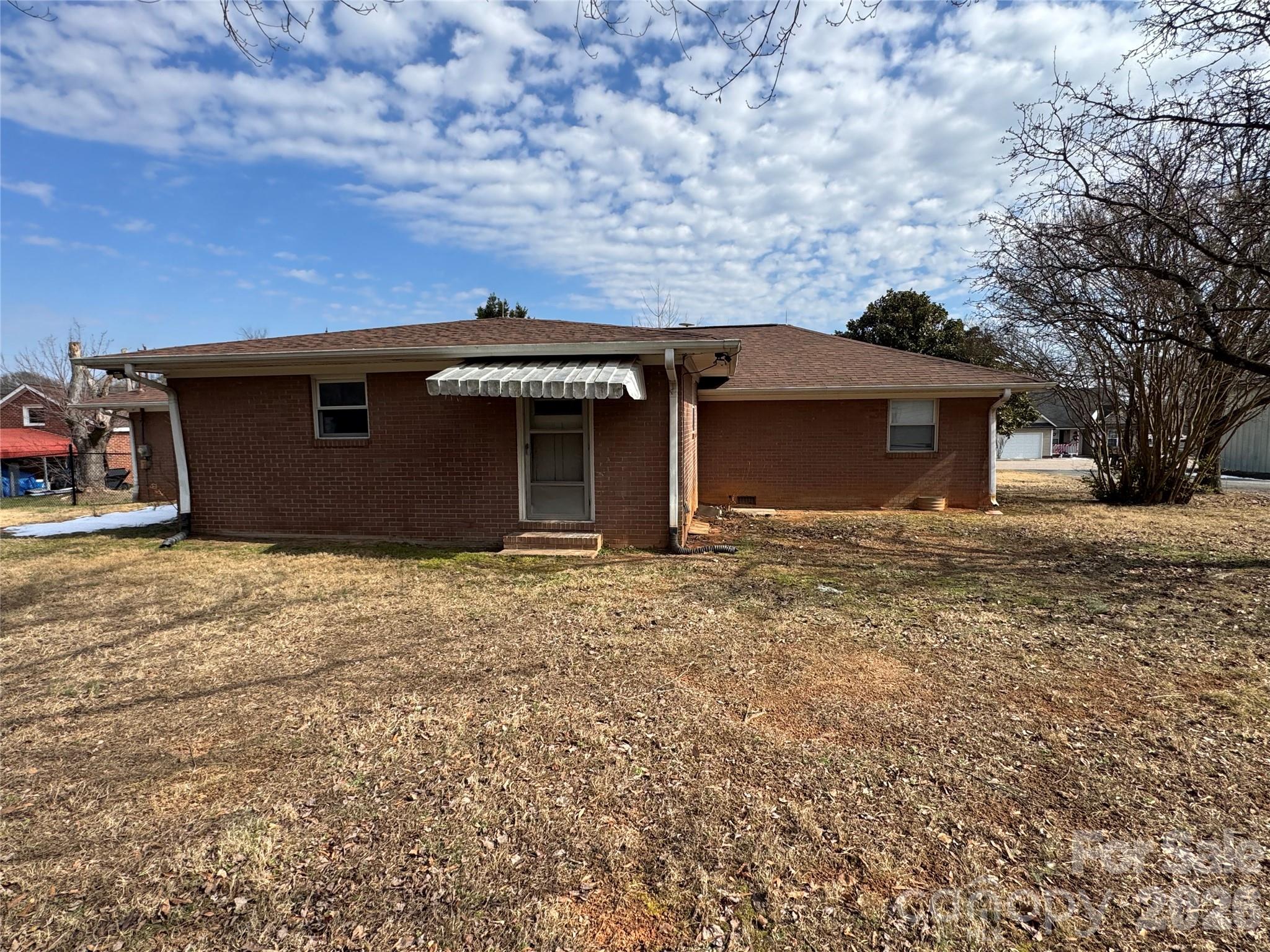 545 Collins Street Kannapolis, NC 28083 - Photo 19 of 27 a front view of a house with a yard