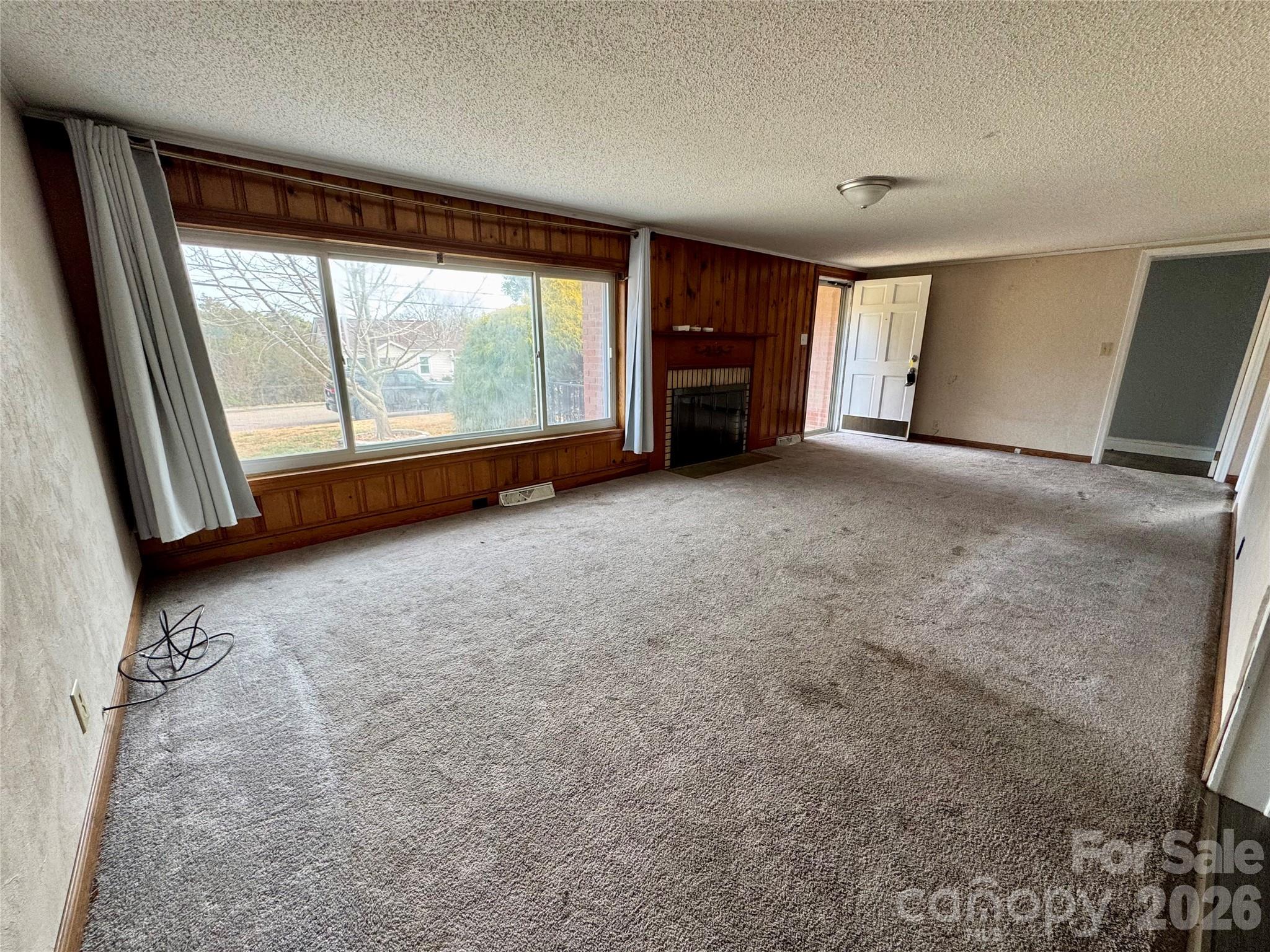 545 Collins Street Kannapolis, NC 28083 - Photo 4 of 27 a view of empty room with front door