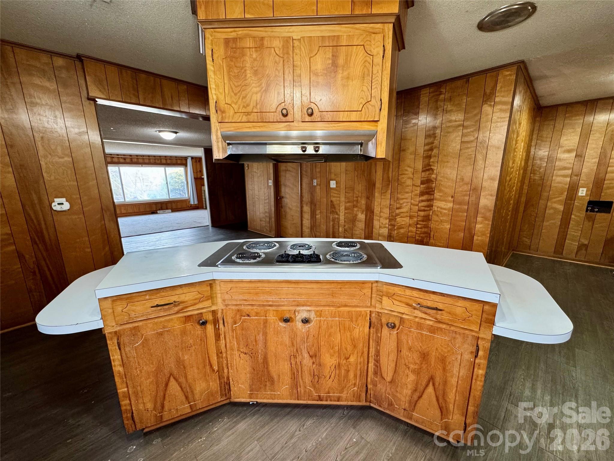 545 Collins Street Kannapolis, NC 28083 - Photo 9 of 27 a kitchen with stainless steel appliances granite countertop a refrigerator a stove and a wooden floors