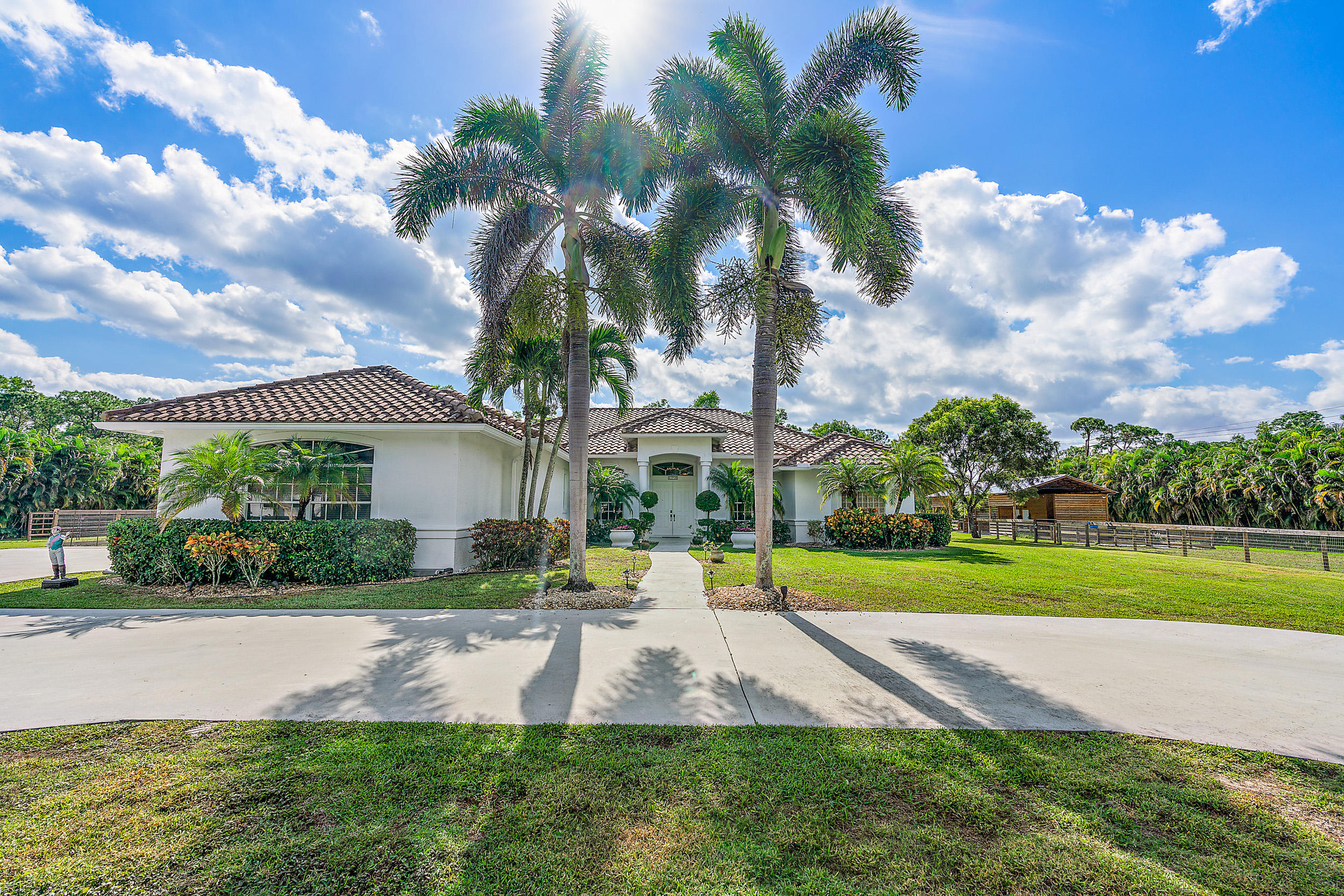 11716 165th Road North Jupiter, FL 33478 - Photo 1 of 38 11716 165th Rd N-2