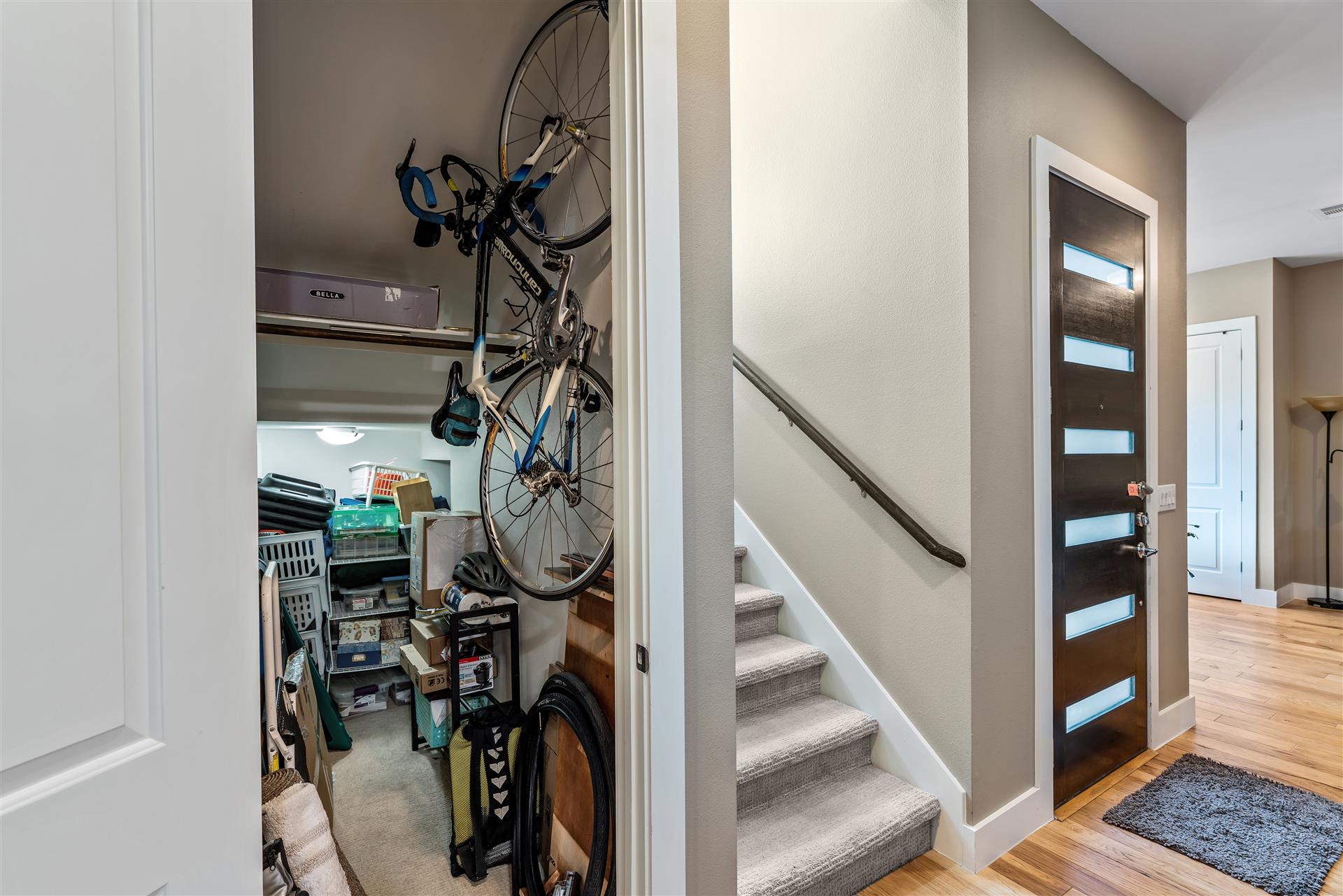 3806 Bull Creek Road, Unit B Austin, TX 78731 - Photo 17 of 37 A clever under-stair storage closet provides excellent organizational space near the entryway and stairs.
