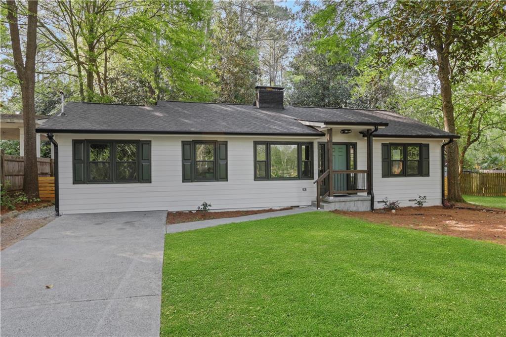 2833 Orion Drive Decatur, GA 30033 - Photo 1 of 1 a view of a house with a yard and sitting area
