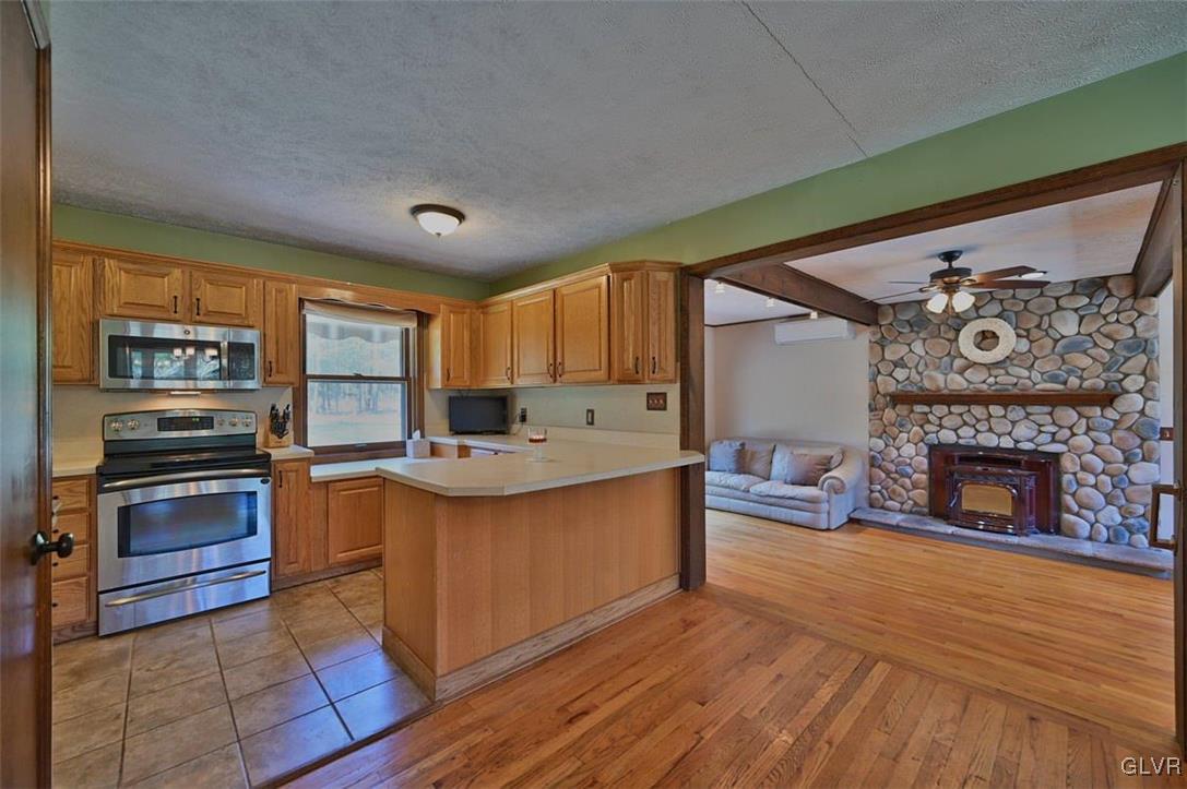 231 Sawmill Road Pocono Lake, PA 18347 - Photo 5 of 50 Open Concept Dining Into Living Area