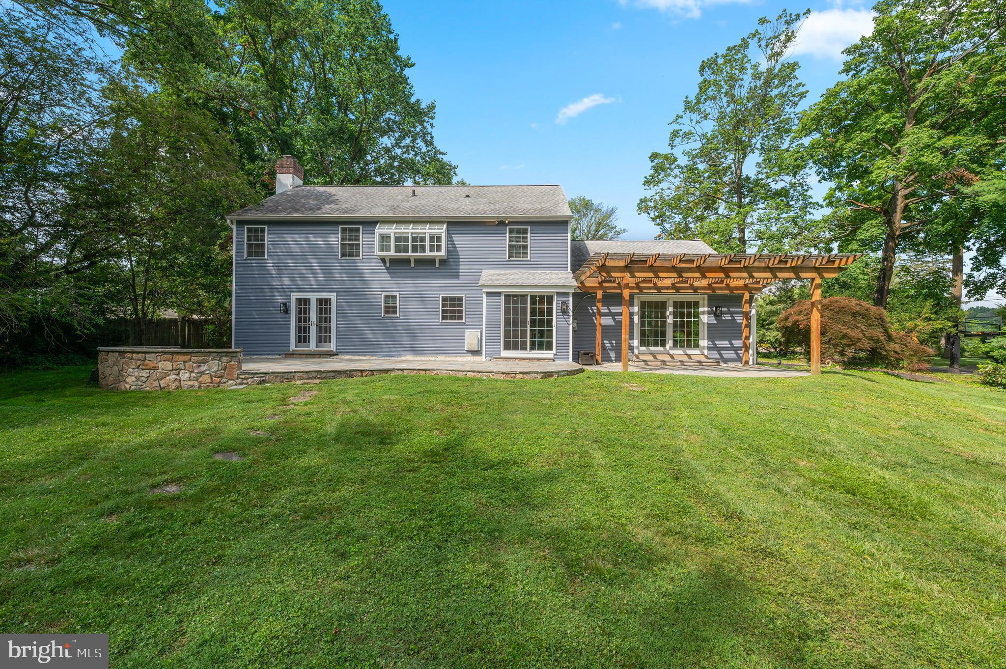 813 Malin Road Newtown Square, PA 19073 - Photo 11 of 55 front view of a house with a yard