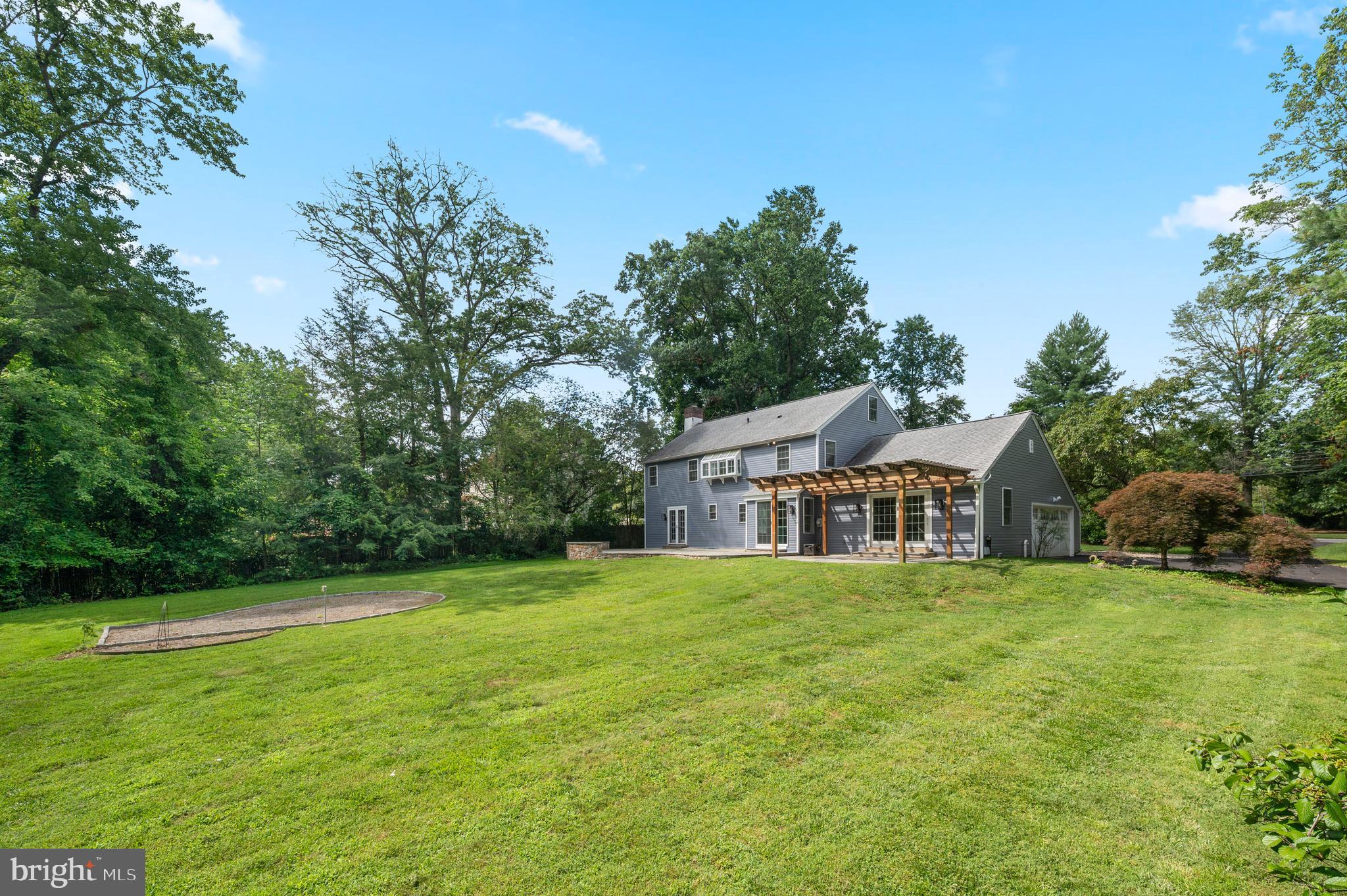 813 Malin Road Newtown Square, PA 19073 - Photo 12 of 55 a front view of a house with a yard