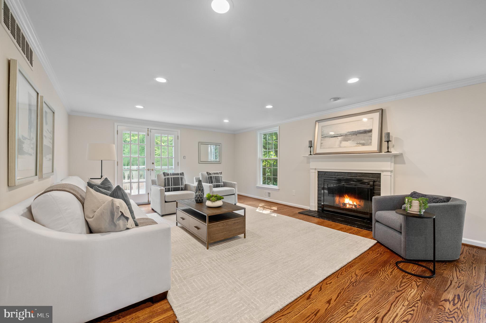 813 Malin Road Newtown Square, PA 19073 - Photo 17 of 55 a living room with furniture and a fireplace
