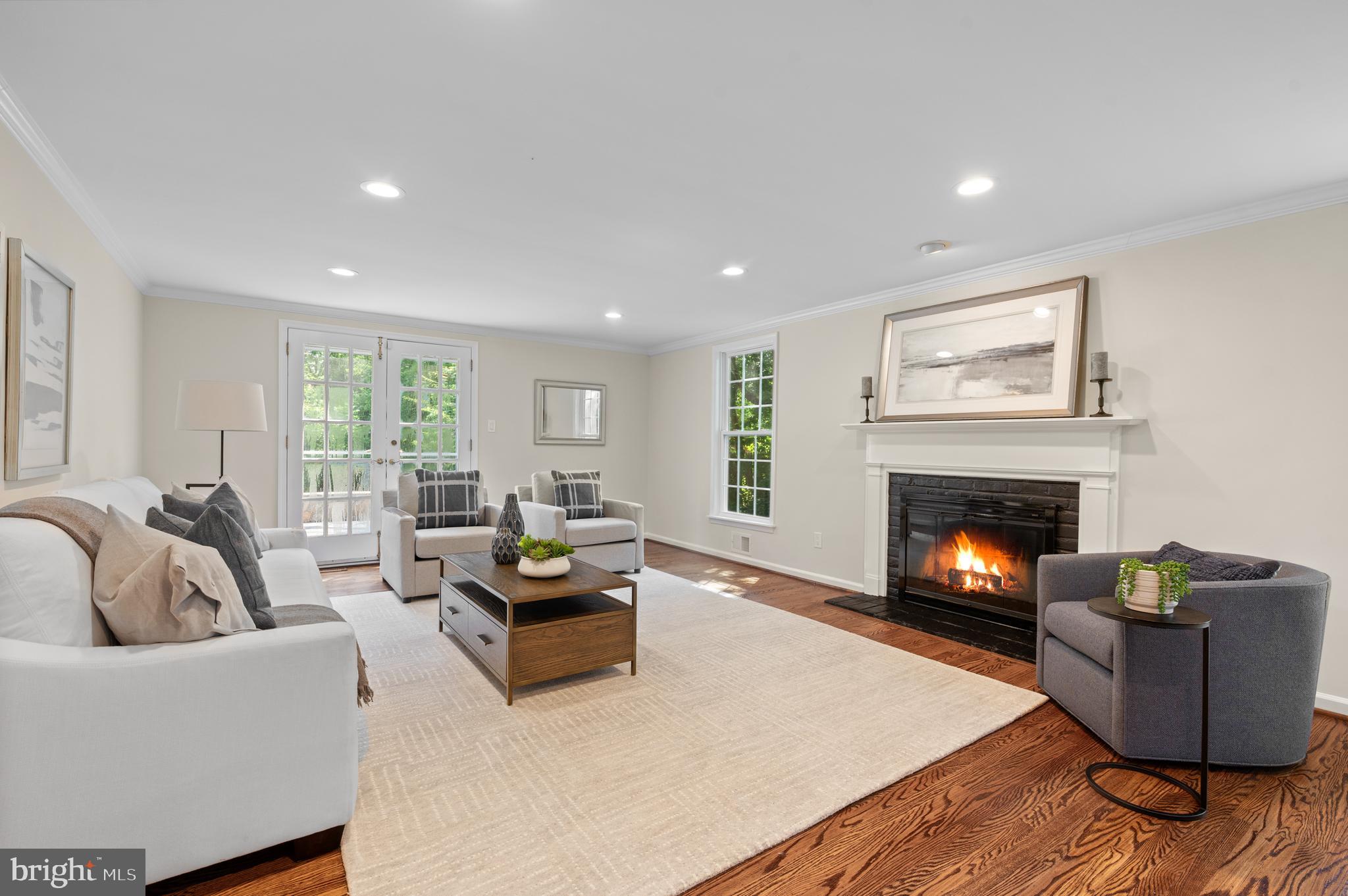 813 Malin Road Newtown Square, PA 19073 - Photo 18 of 55 a living room with furniture and a fireplace