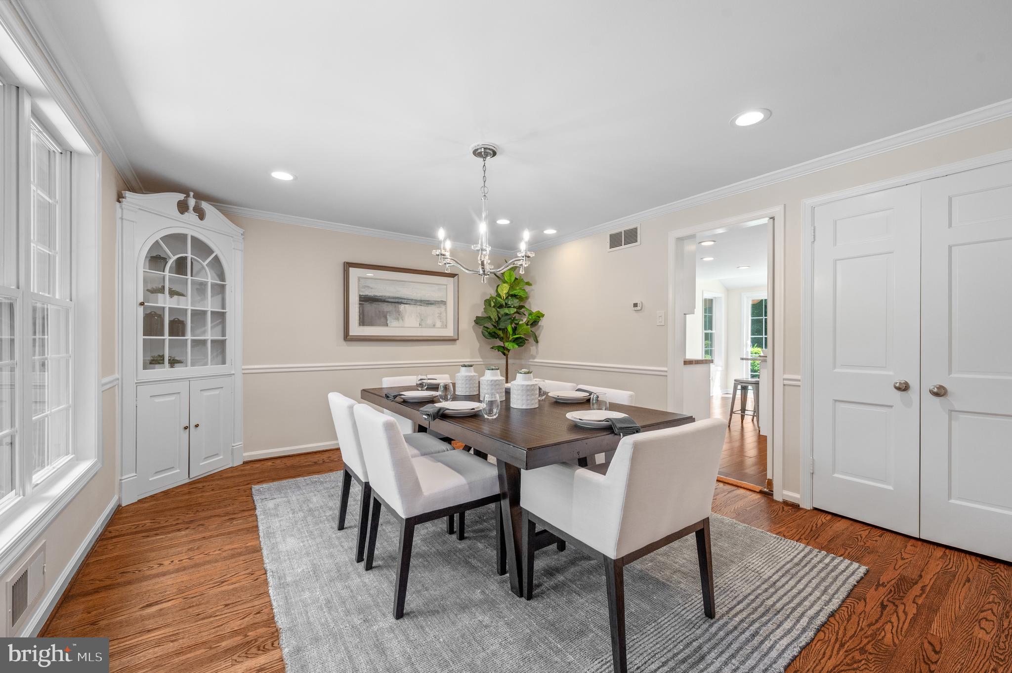 813 Malin Road Newtown Square, PA 19073 - Photo 20 of 55 a view of a dining room with furniture window and wooden floor