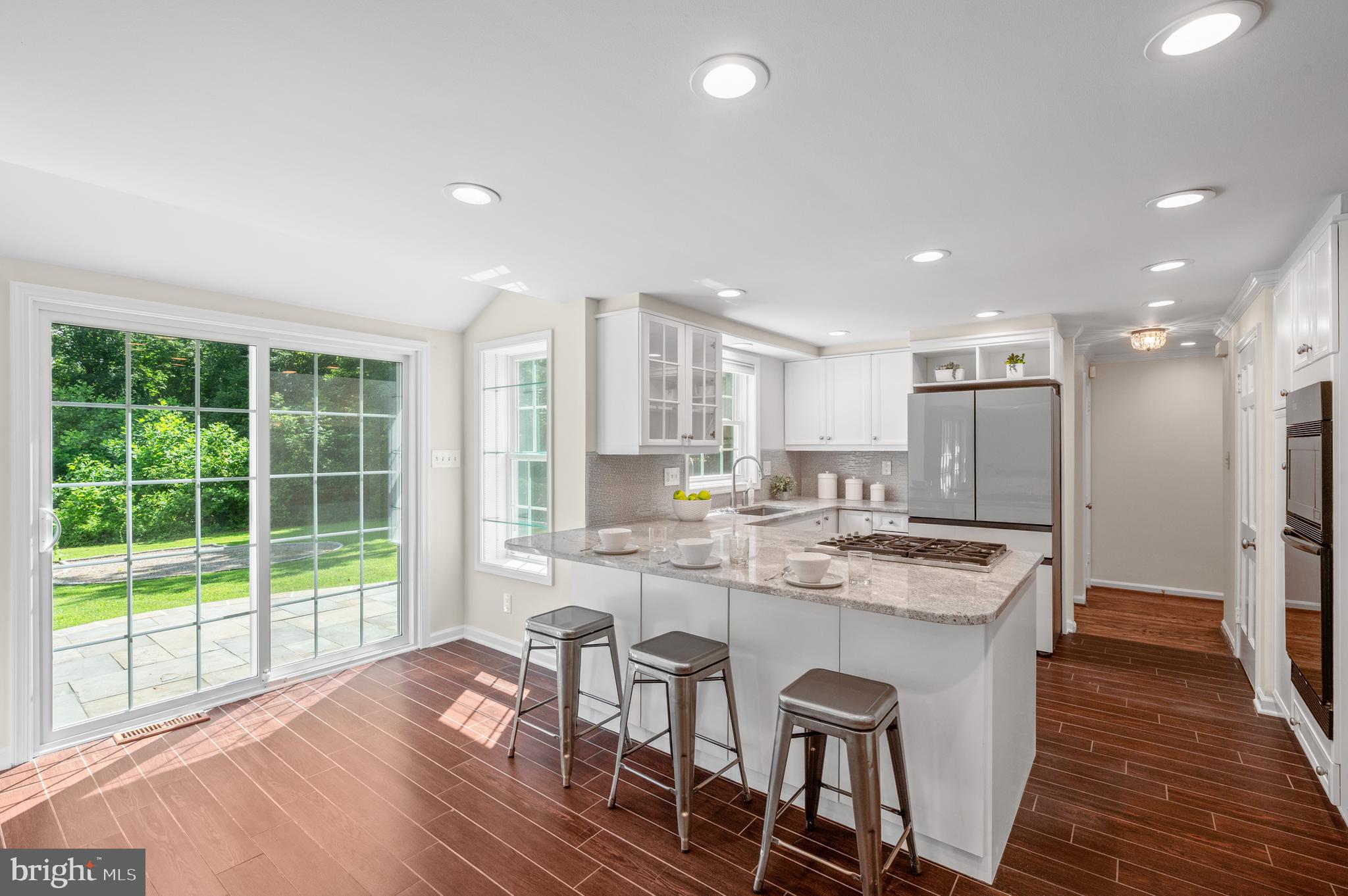 813 Malin Road Newtown Square, PA 19073 - Photo 22 of 55 a large kitchen with kitchen island a large island in it