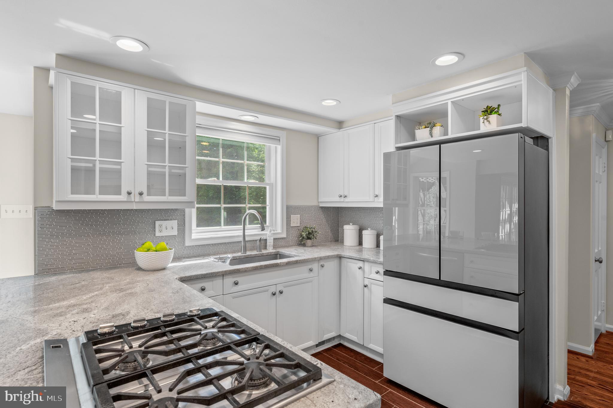 813 Malin Road Newtown Square, PA 19073 - Photo 23 of 55 a kitchen with a sink and a refrigerator