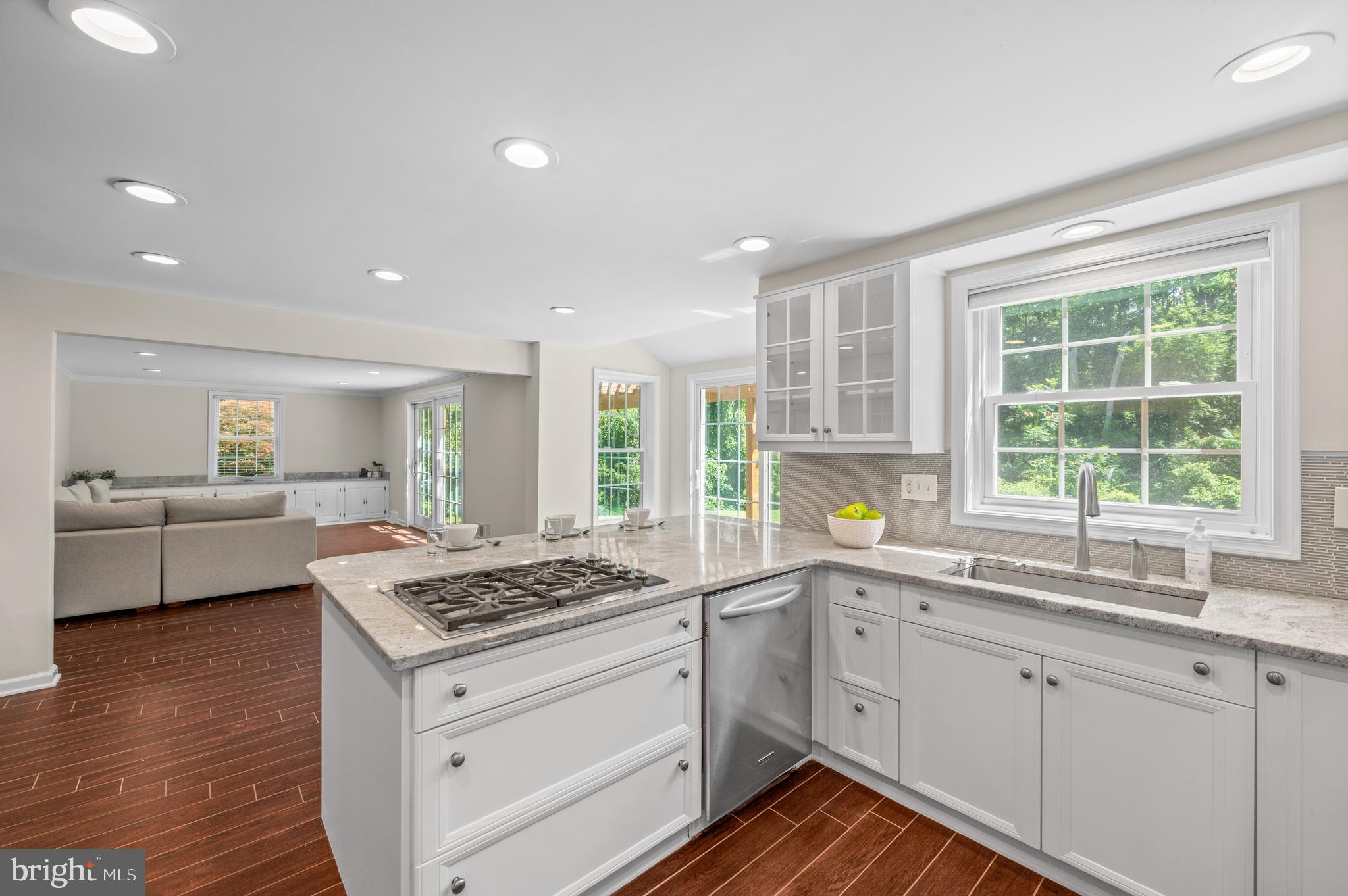 813 Malin Road Newtown Square, PA 19073 - Photo 24 of 55 a open kitchen with sink cabinets and wooden floor