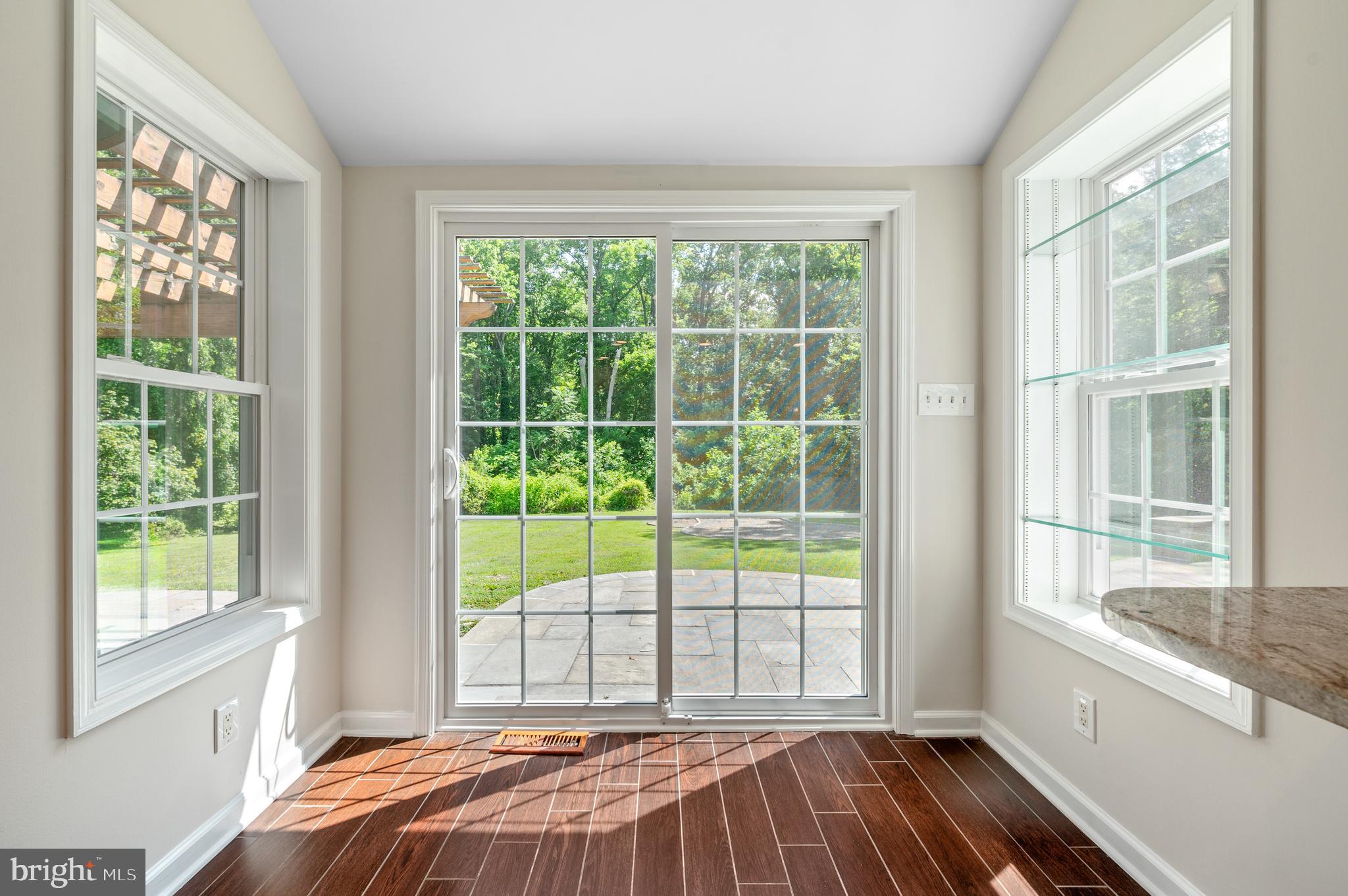 813 Malin Road Newtown Square, PA 19073 - Photo 27 of 55 a bedroom with a large bed and a large window
