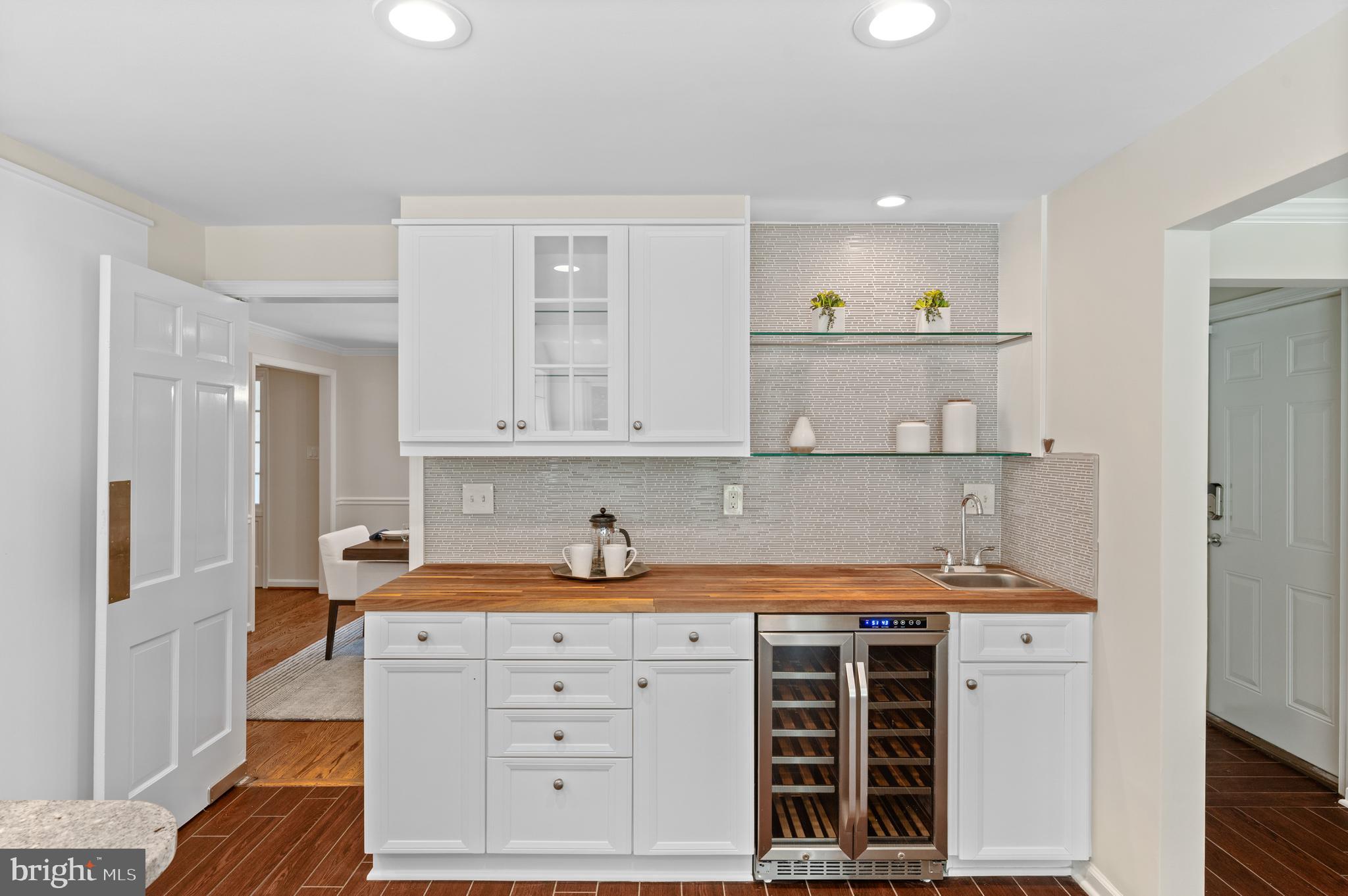 813 Malin Road Newtown Square, PA 19073 - Photo 28 of 55 a kitchen with a stove cabinets and wooden floor