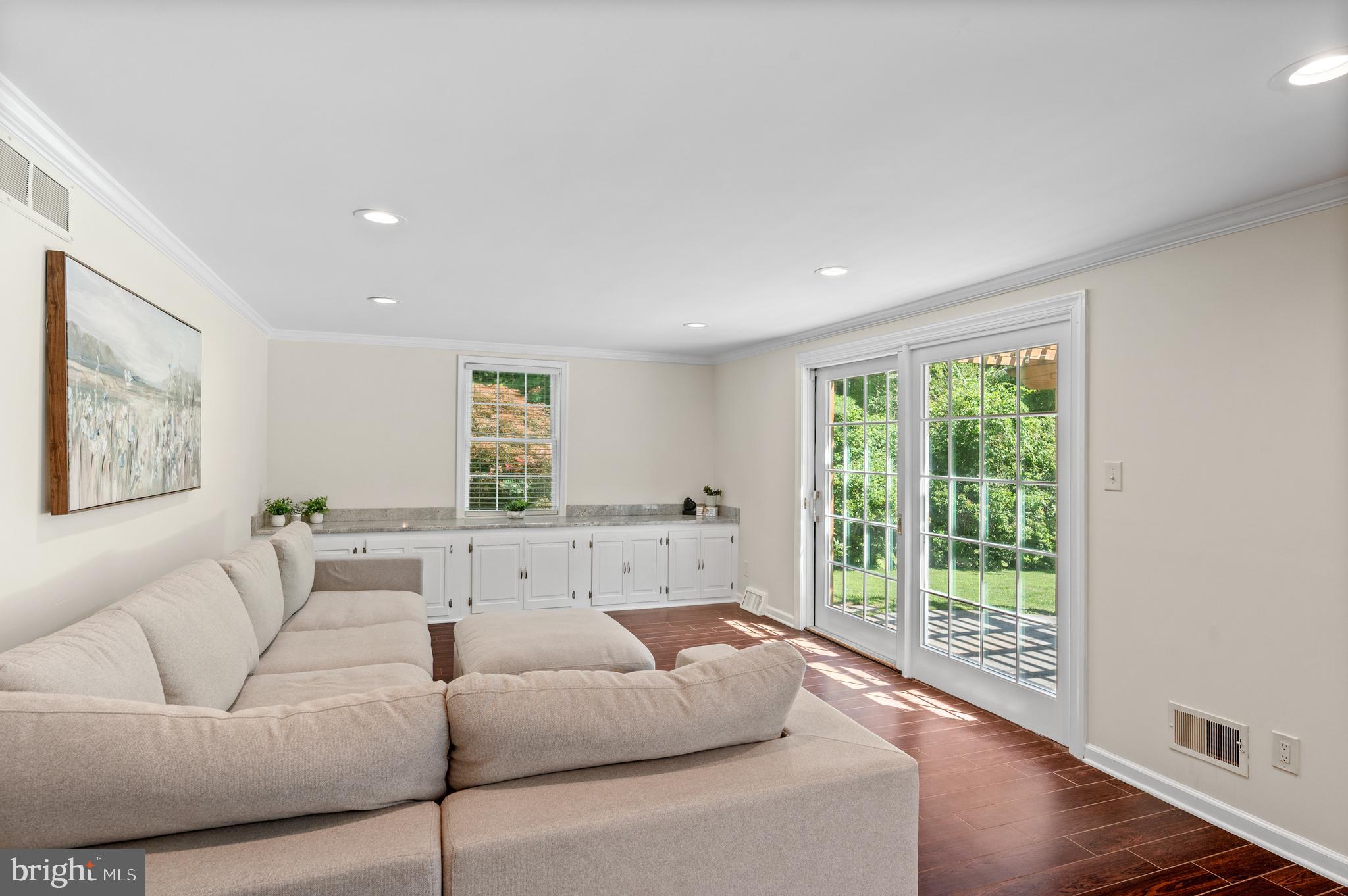 813 Malin Road Newtown Square, PA 19073 - Photo 29 of 55 a living room with furniture and a large window
