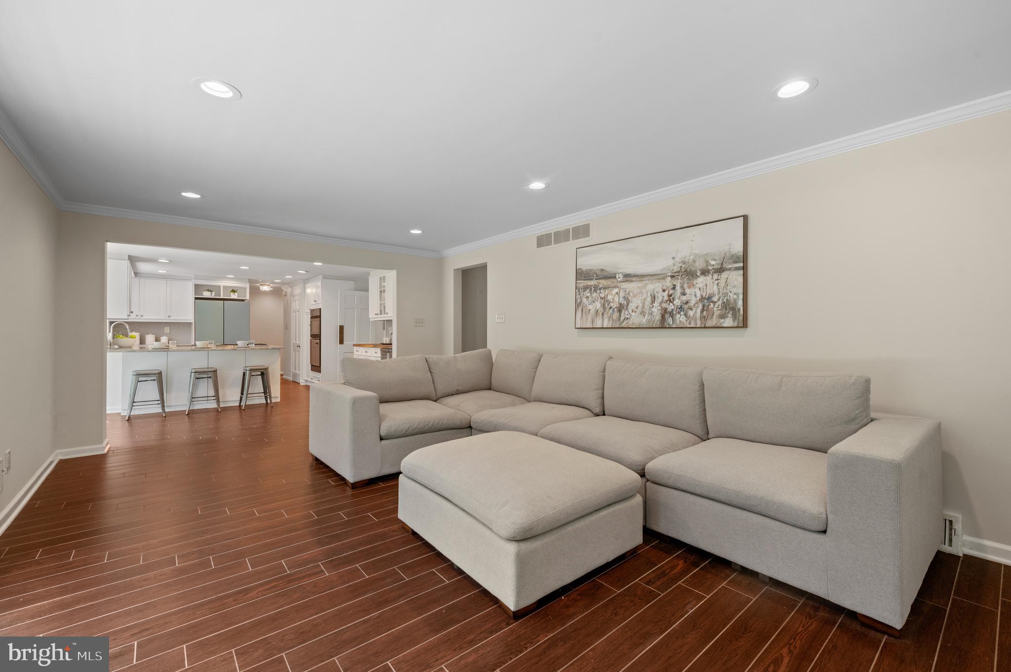 813 Malin Road Newtown Square, PA 19073 - Photo 30 of 55 a living room with furniture and a wooden floor