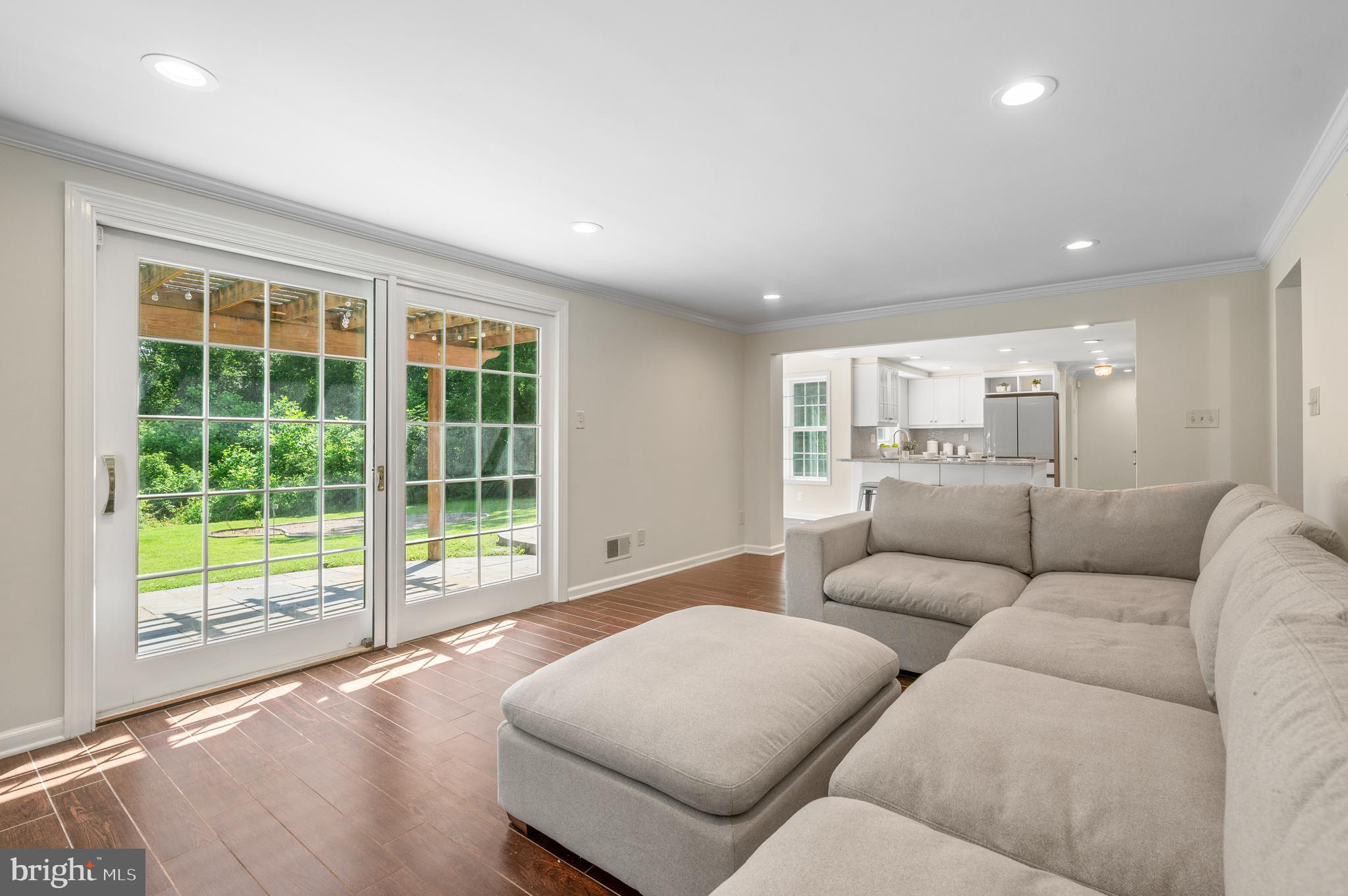 813 Malin Road Newtown Square, PA 19073 - Photo 31 of 55 a living room with furniture and a large window