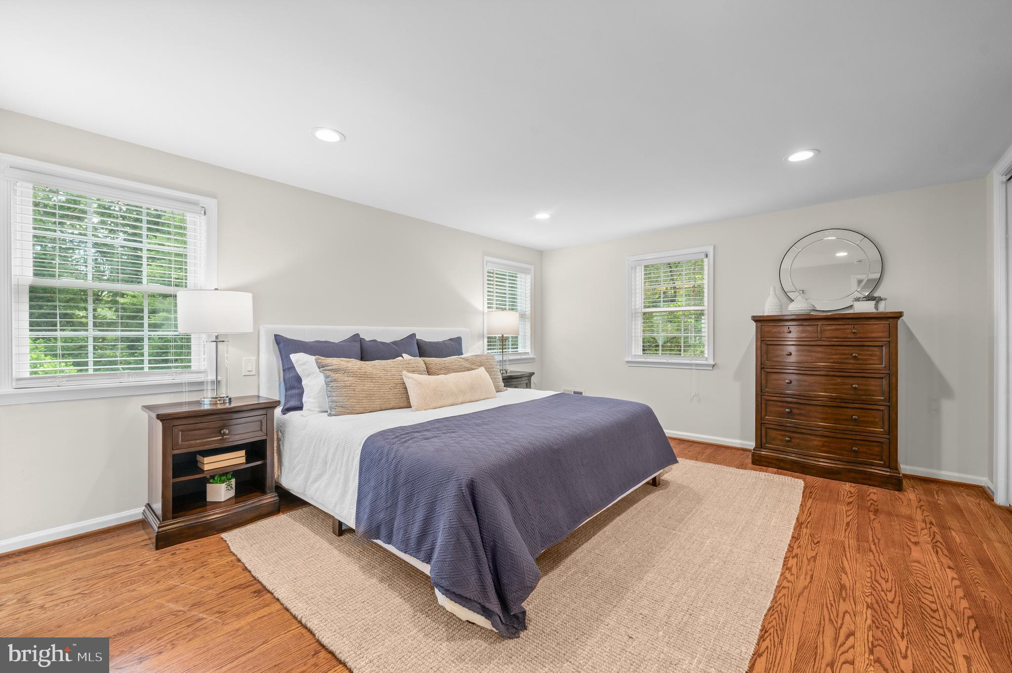 813 Malin Road Newtown Square, PA 19073 - Photo 34 of 55 a bedroom with a bed and a dresser