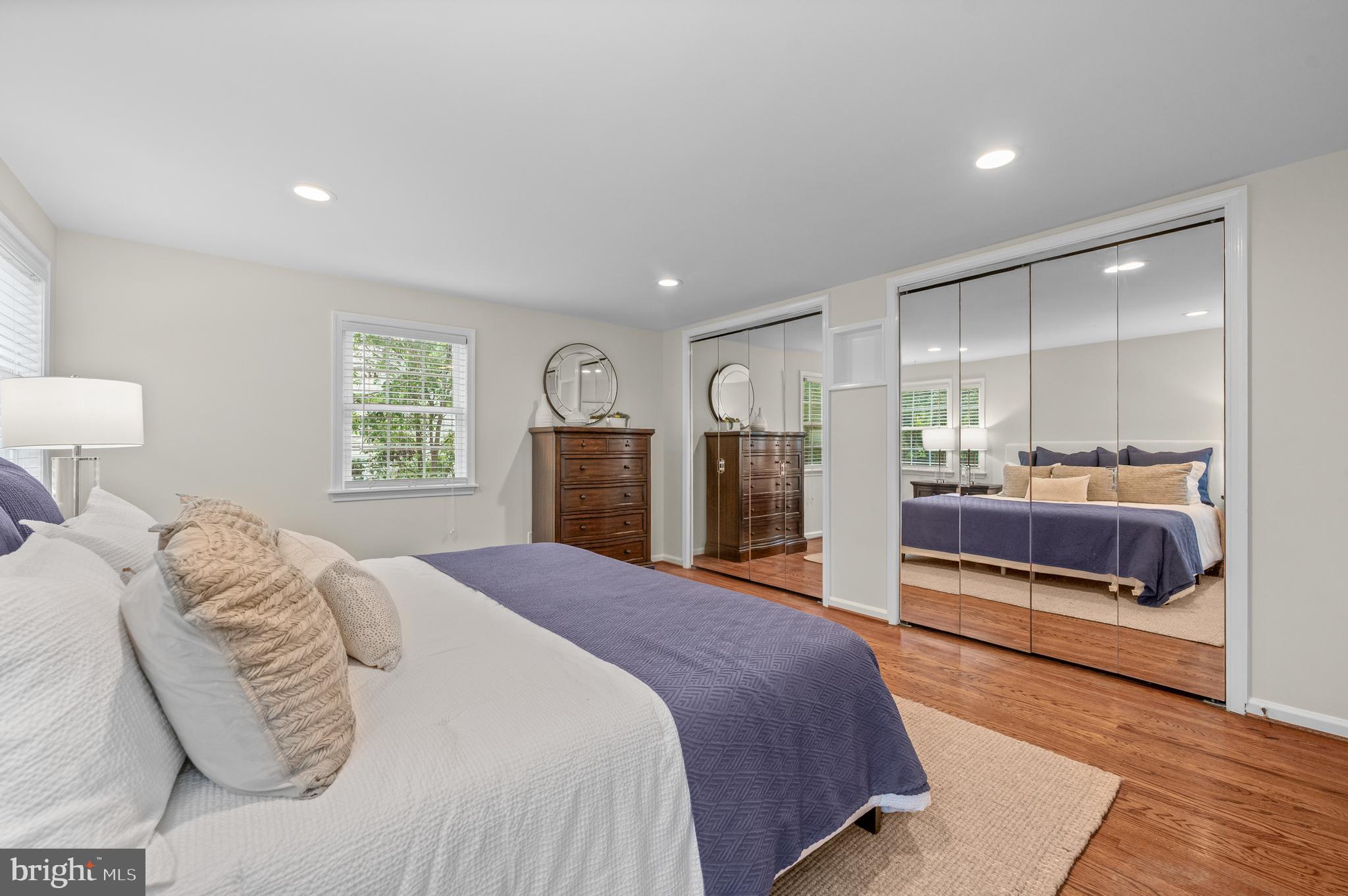813 Malin Road Newtown Square, PA 19073 - Photo 35 of 55 a spacious bedroom with a large bed and a dresser
