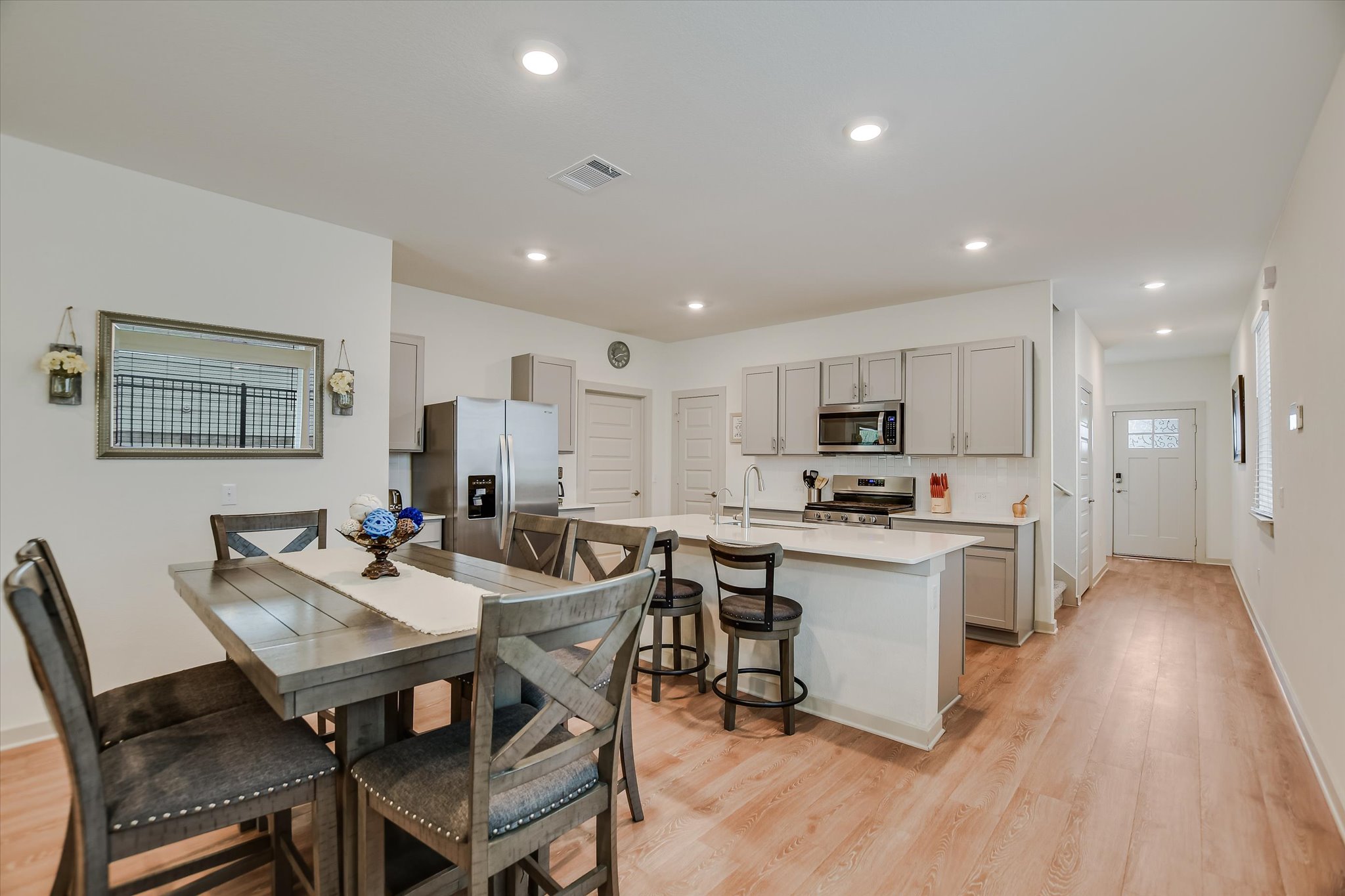 105 Merrick Road Georgetown, TX 78628 - Photo 4 of 23 Bright and open-concept kitchen with a dining area, offering ample space for entertaining and everyday living.