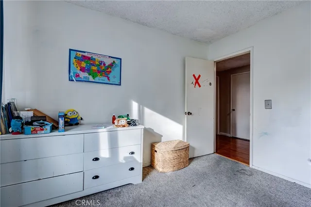 an aerial view of a houses with yard