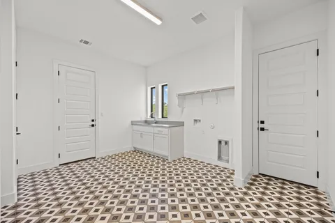 a bathroom with a sink a toilet and a shower