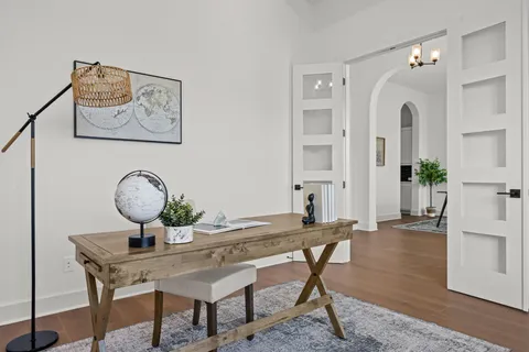 a view of a workspace with furniture