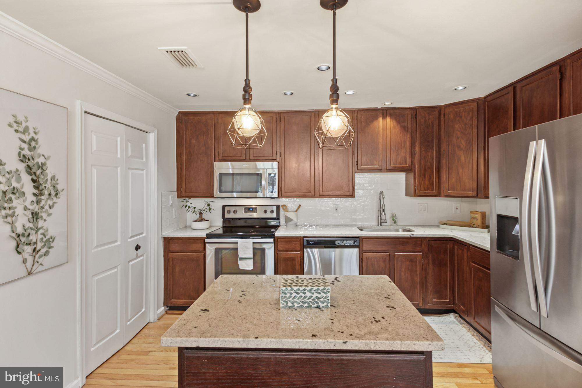 3459 Hewitt Avenue, Unit 204 Silver Spring, MD 20906 - Photo 3 of 28 Open and bright kitchen