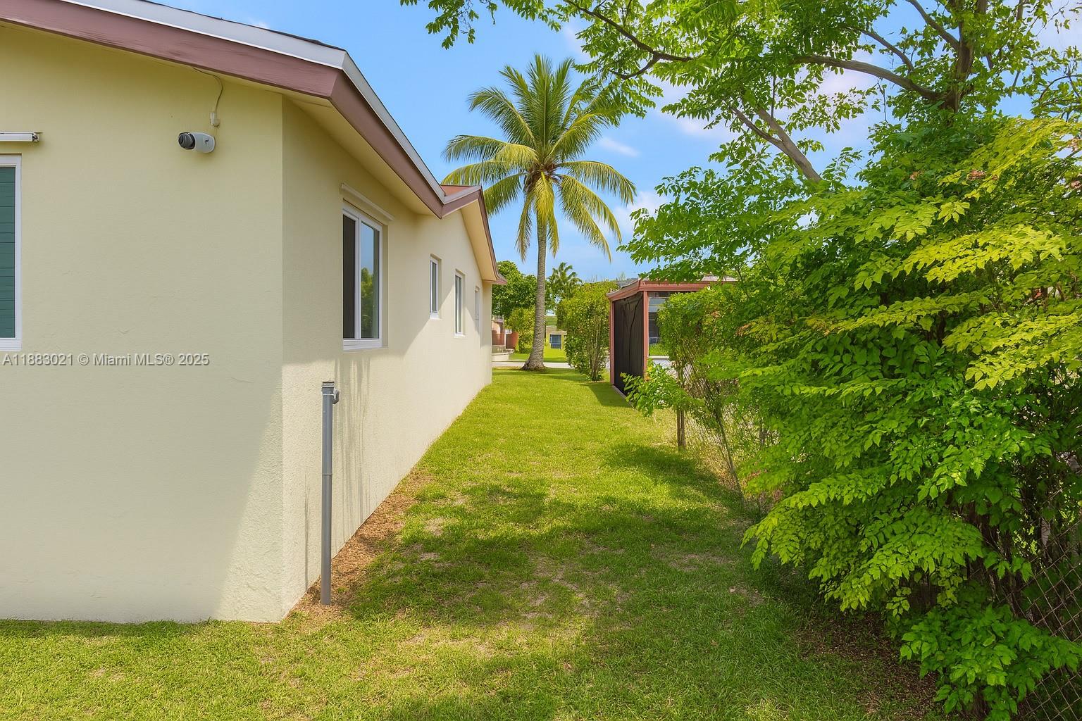 3770 Northwest 8th Place Lauderhill, FL 33311 - Photo 18 of 31 a view of a yard with an outdoor space