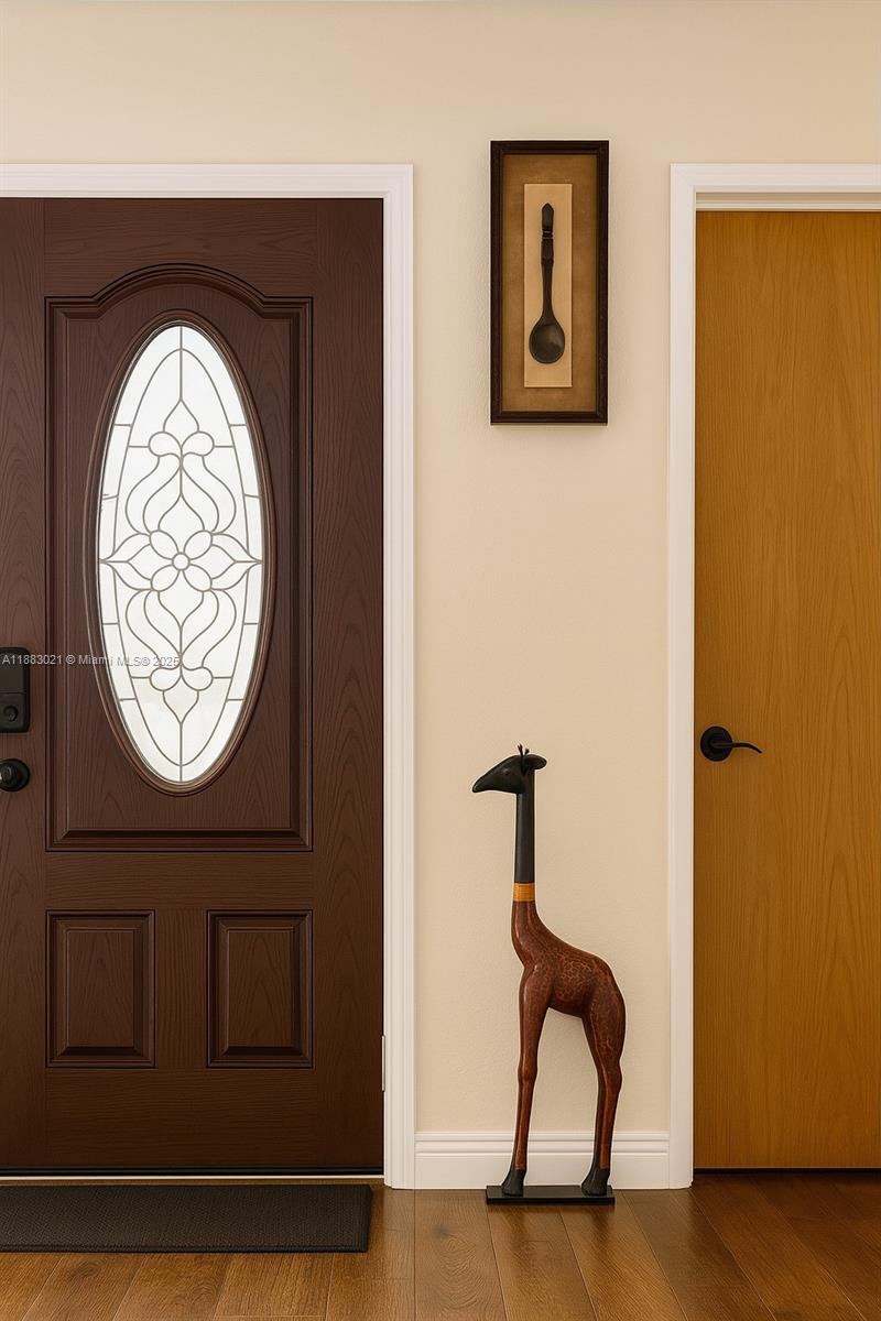 3770 Northwest 8th Place Lauderhill, FL 33311 - Photo 22 of 31 a view of a entryway with wooden floor