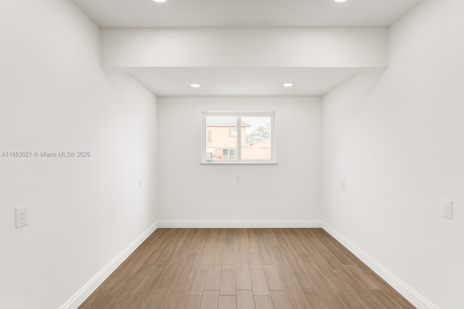 3770 Northwest 8th Place Lauderhill, FL 33311 - Photo 26 of 31 a view of a room that has a window in it