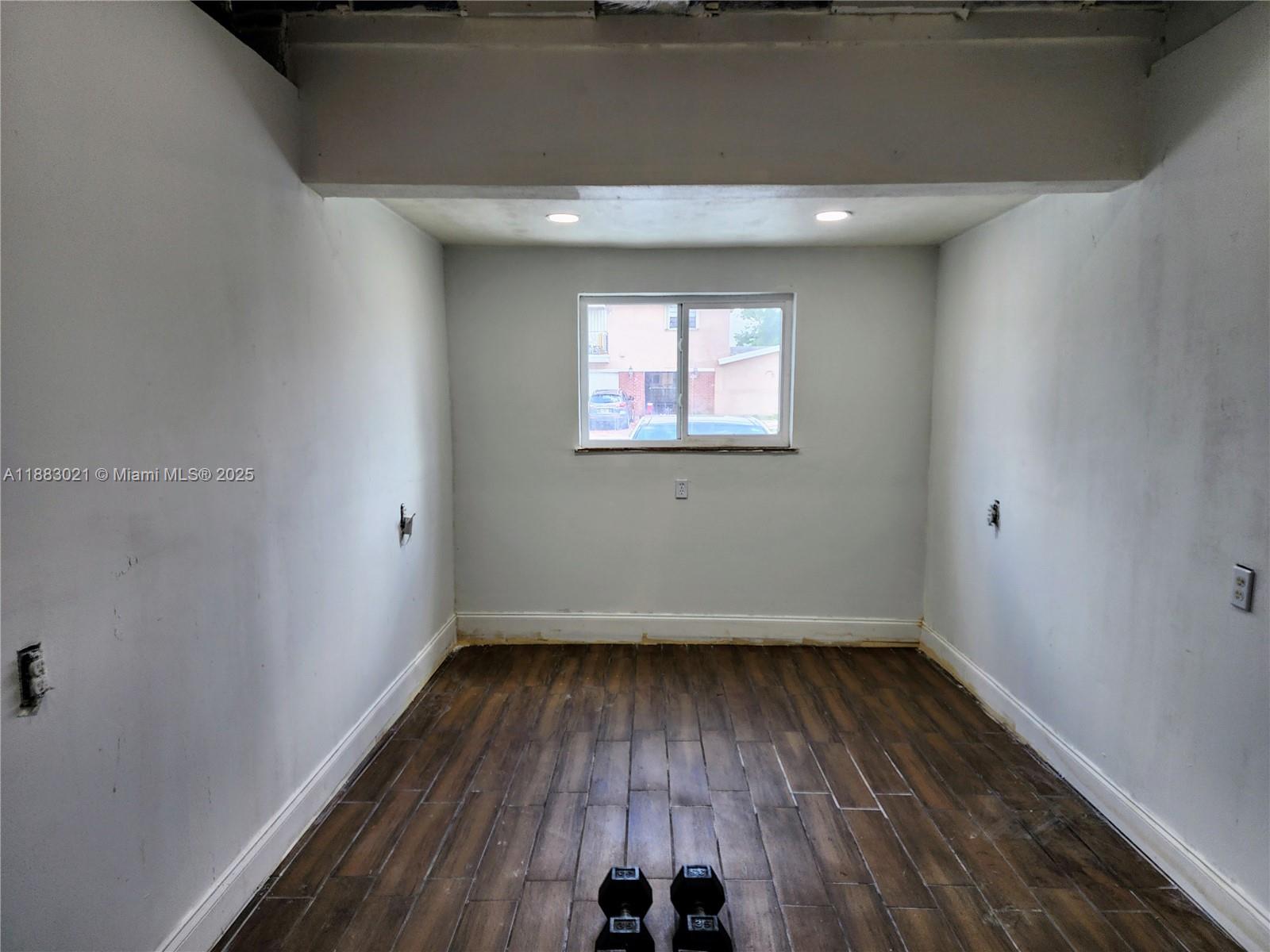 3770 Northwest 8th Place Lauderhill, FL 33311 - Photo 27 of 31 a view of empty room with wooden floor
