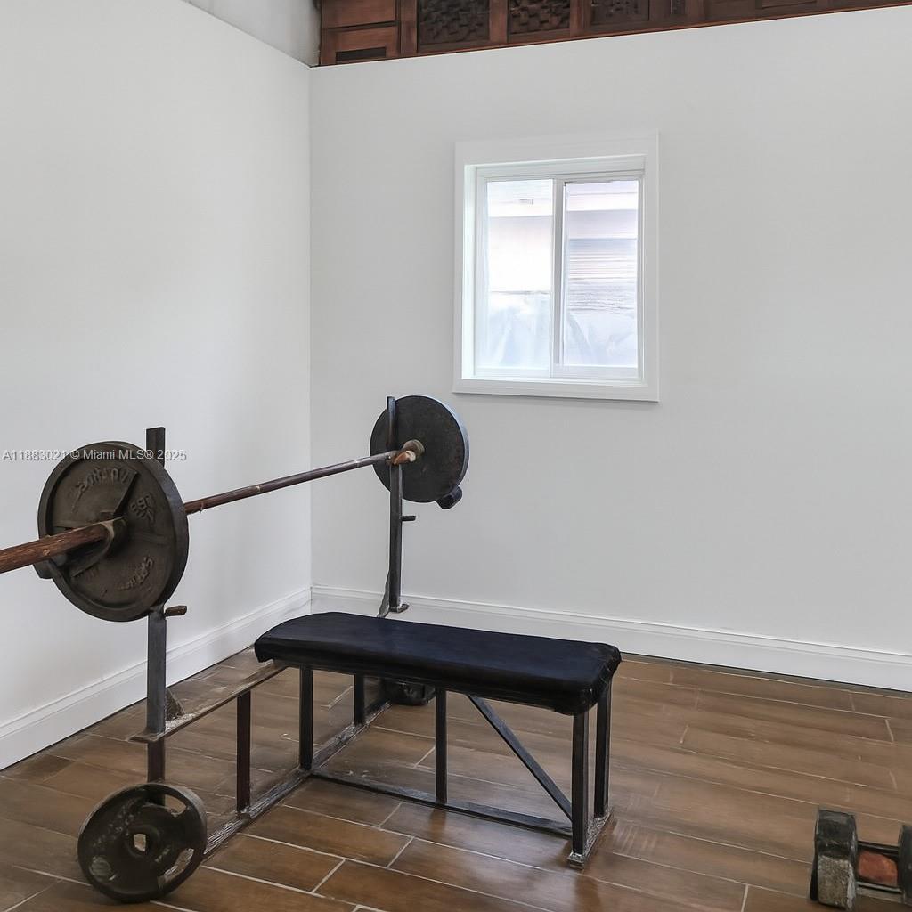3770 Northwest 8th Place Lauderhill, FL 33311 - Photo 28 of 31 a view of a room with a window and wooden floor