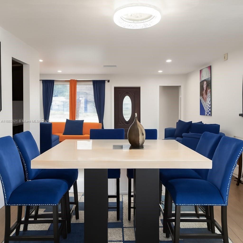 3770 Northwest 8th Place Lauderhill, FL 33311 - Photo 4 of 31 a view of a dining room with furniture