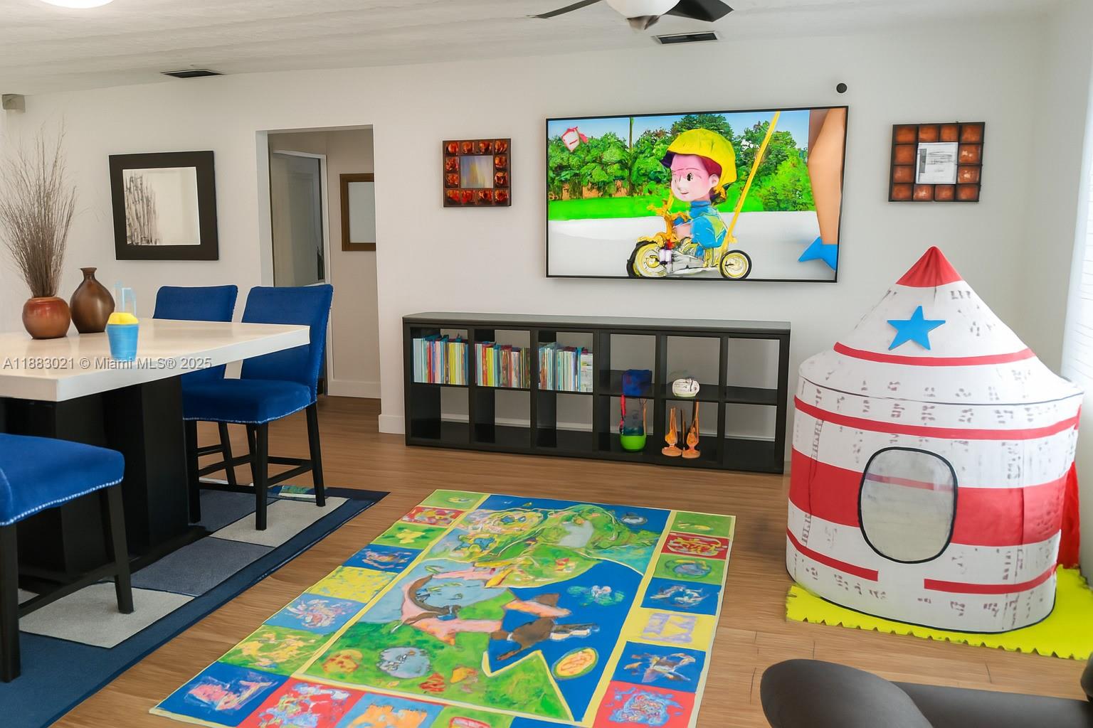 3770 Northwest 8th Place Lauderhill, FL 33311 - Photo 5 of 31 a living room filled with furniture and a table