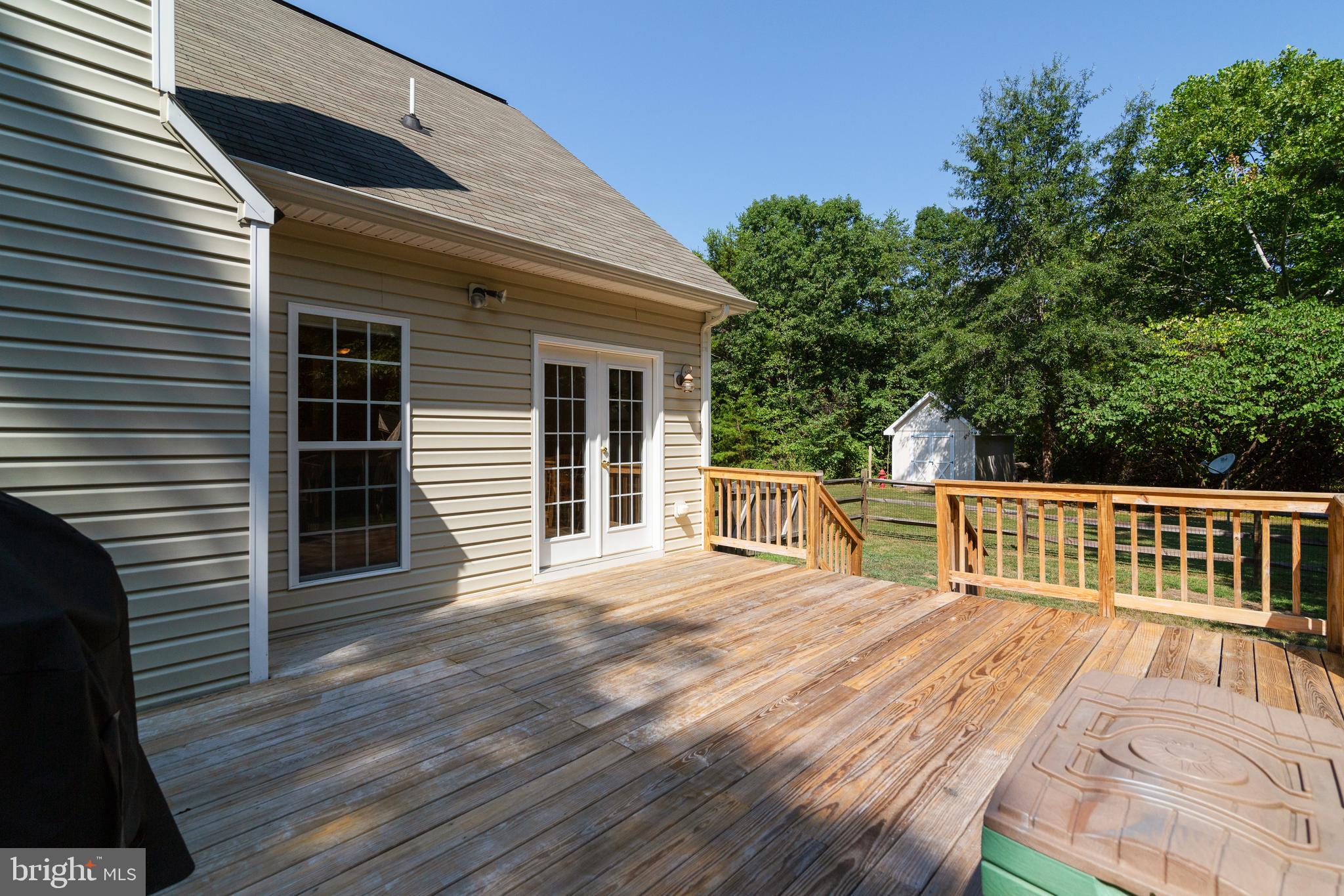 8289 Swan Woods Road Rhoadesville, VA 22542 - Photo 14 of 32 Gorgeous large rear deck perfect for entertaining