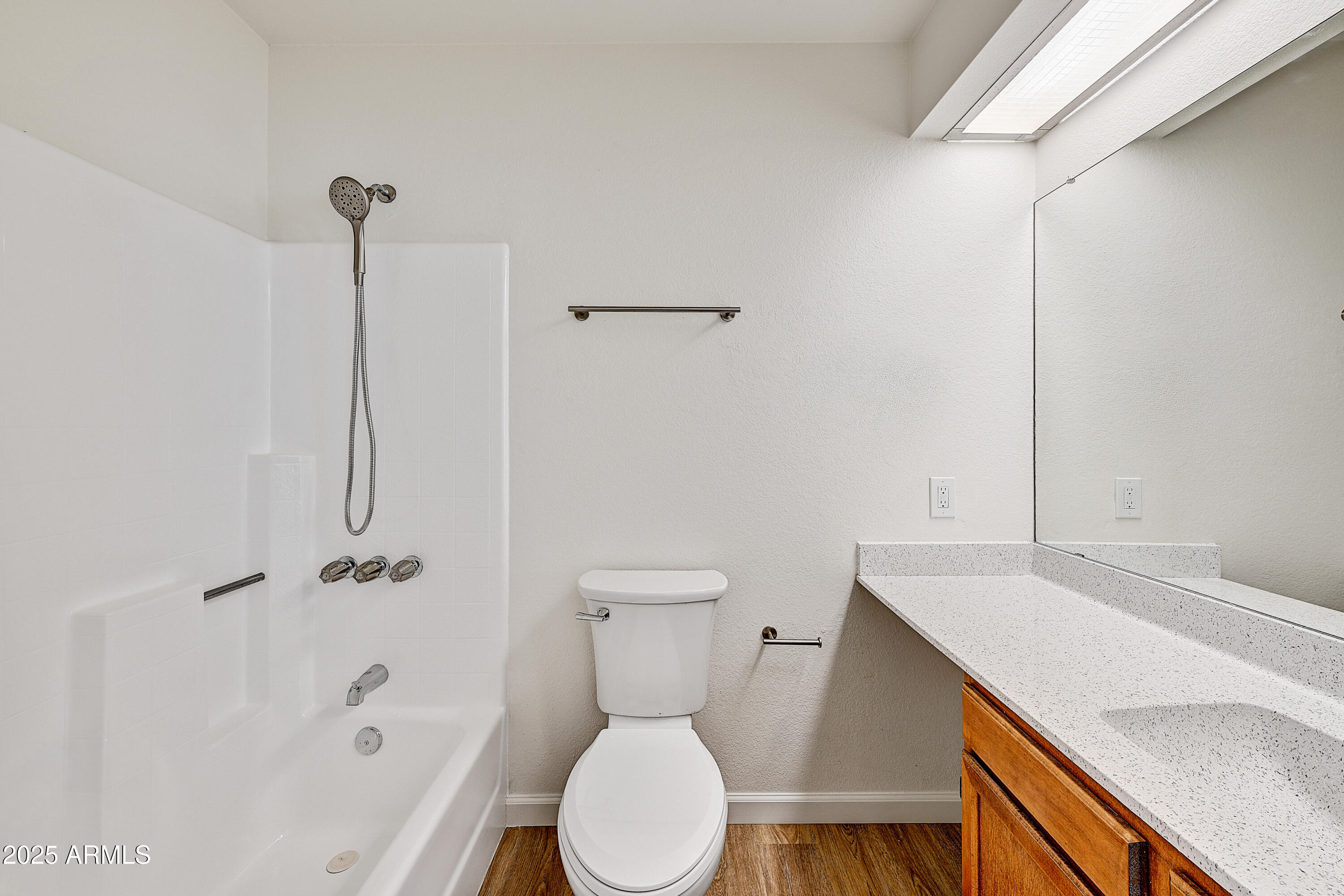 925 North College Avenue, Unit E217 Tempe, AZ 85288 - Photo 17 of 32 a bathroom with a sink a toilet and shower