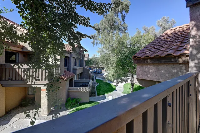a view of house with wooden fencing