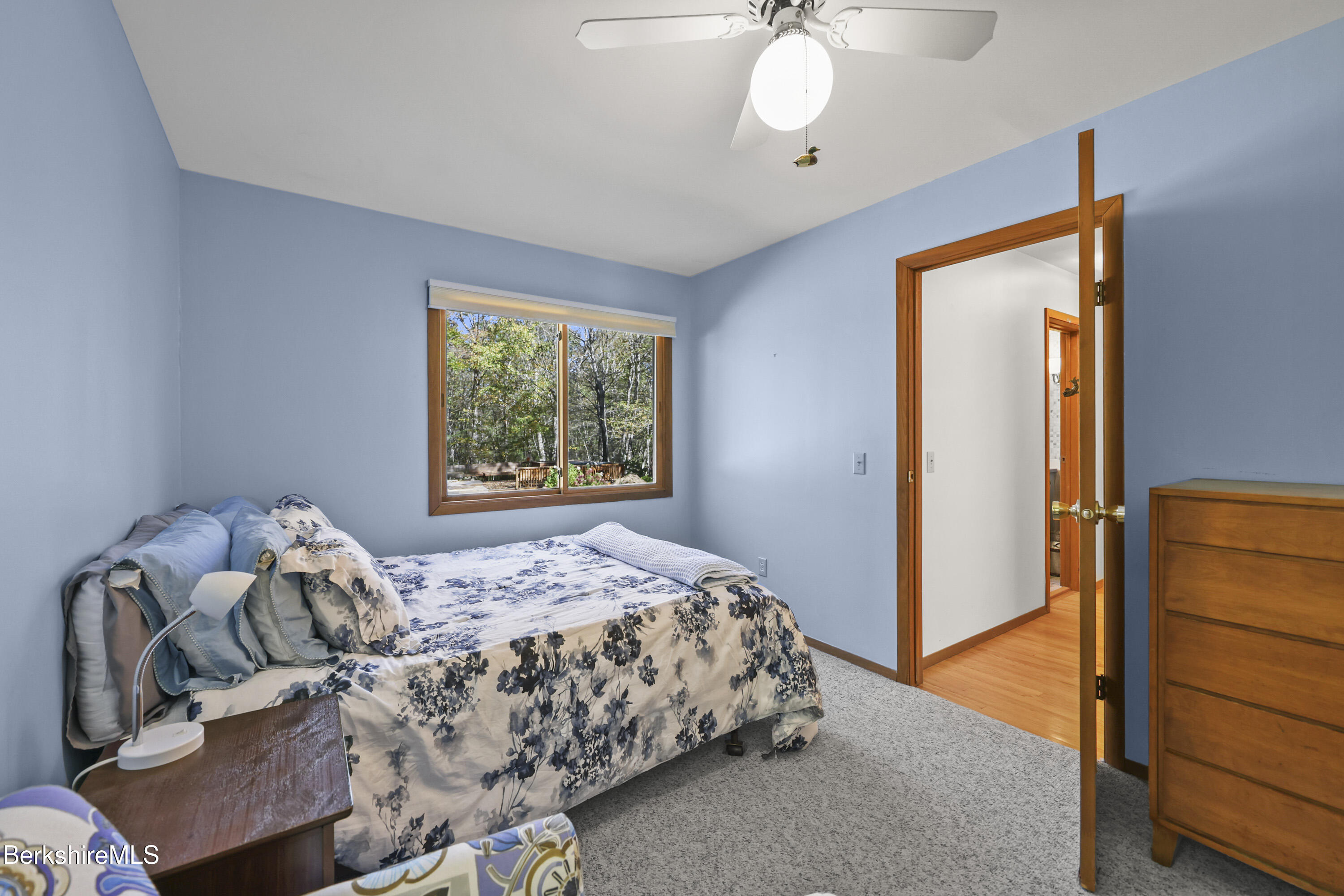 337 Captain Whitney Road Becket, MA 01223 - Photo 24 of 53 a bedroom with a bed and a window