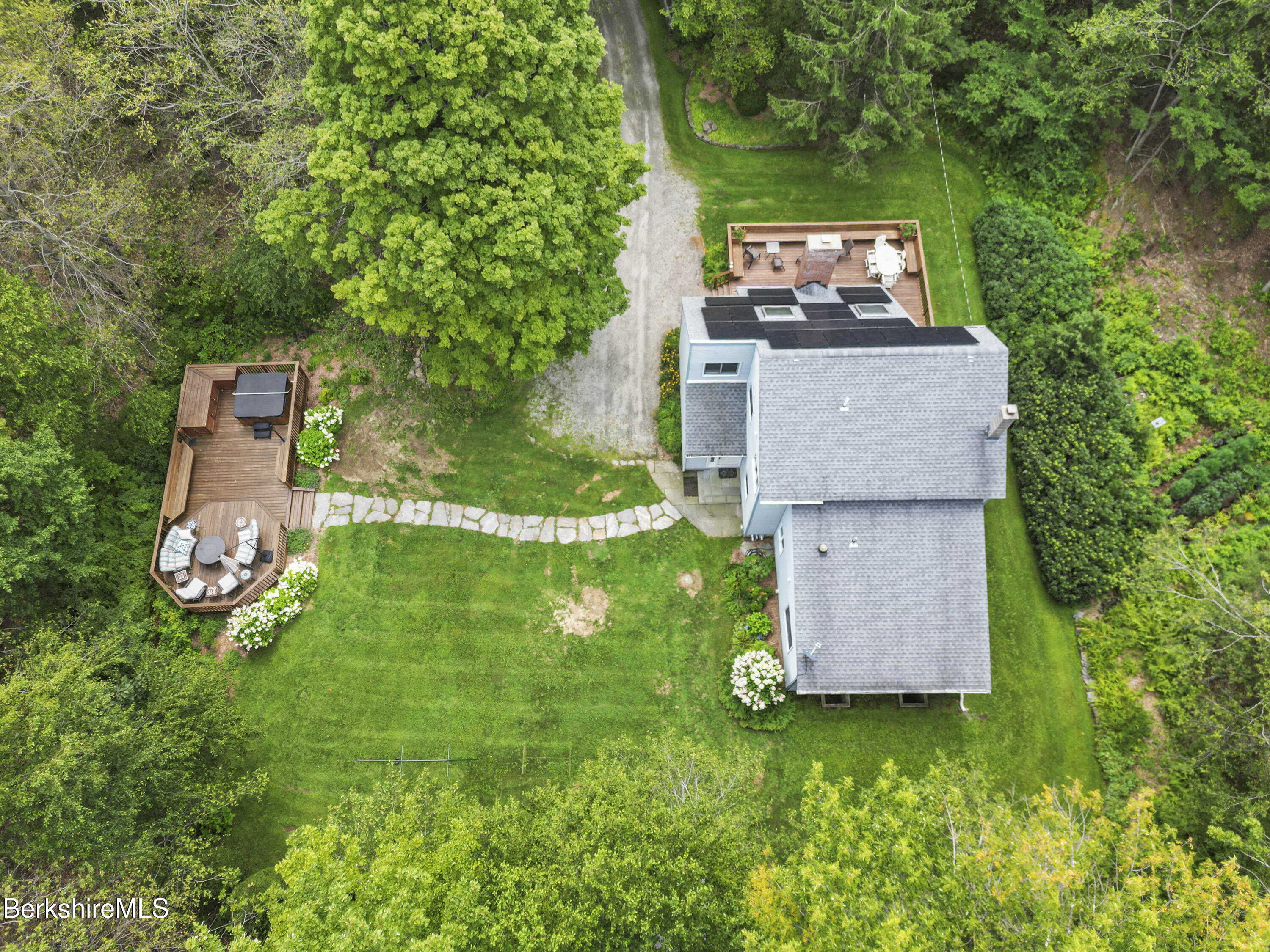 337 Captain Whitney Road Becket, MA 01223 - Photo 3 of 53 an aerial view of a house with a yard