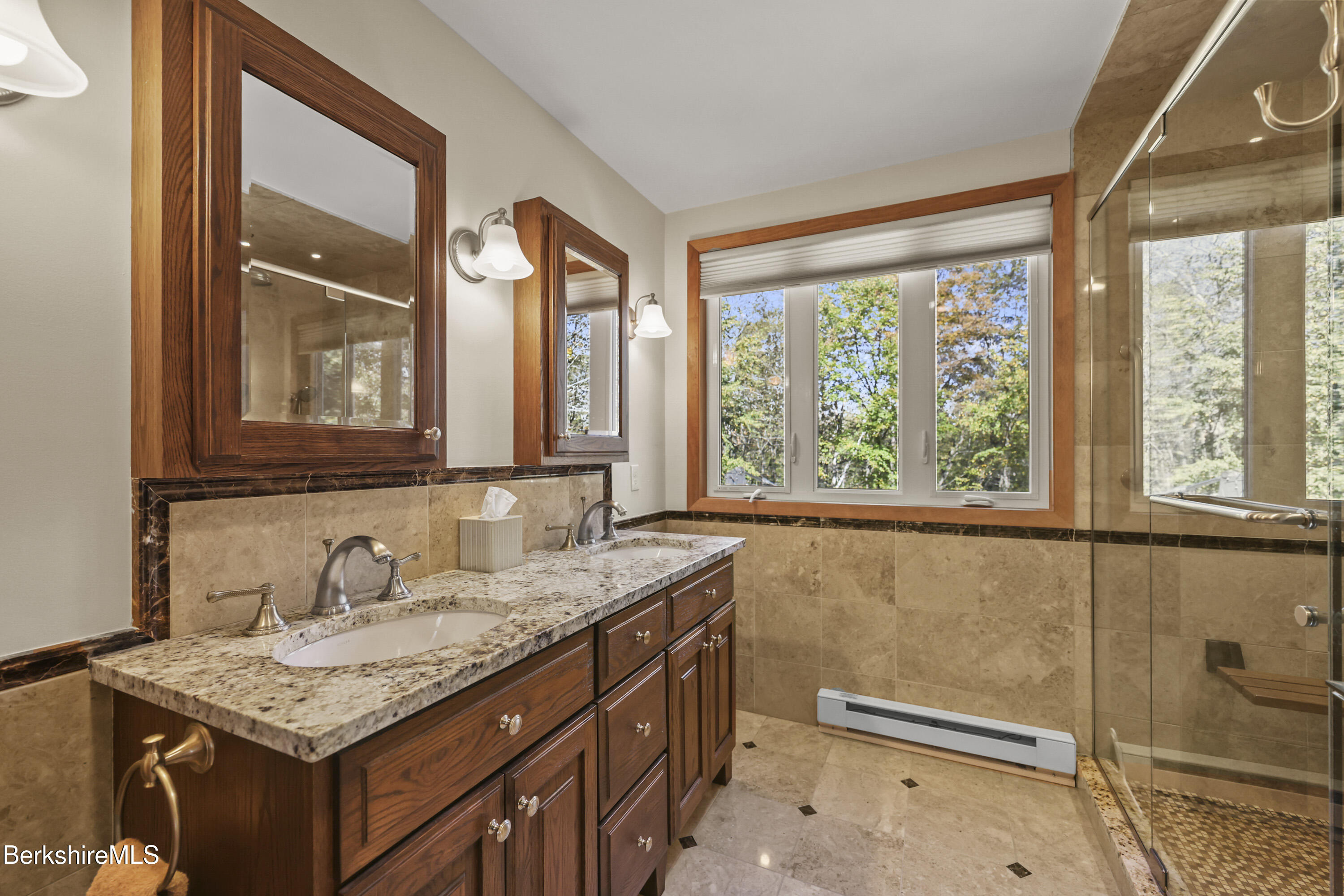 337 Captain Whitney Road Becket, MA 01223 - Photo 32 of 53 a bathroom with a granite countertop sink and a window