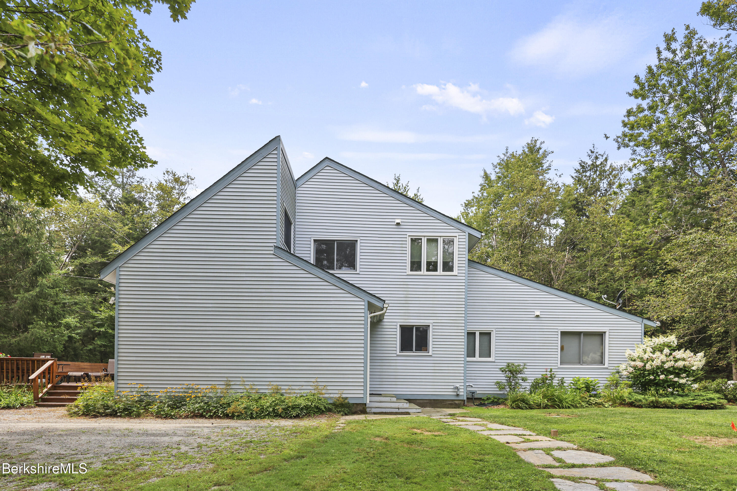 337 Captain Whitney Road Becket, MA 01223 - Photo 43 of 53 a view of a backyard of the house