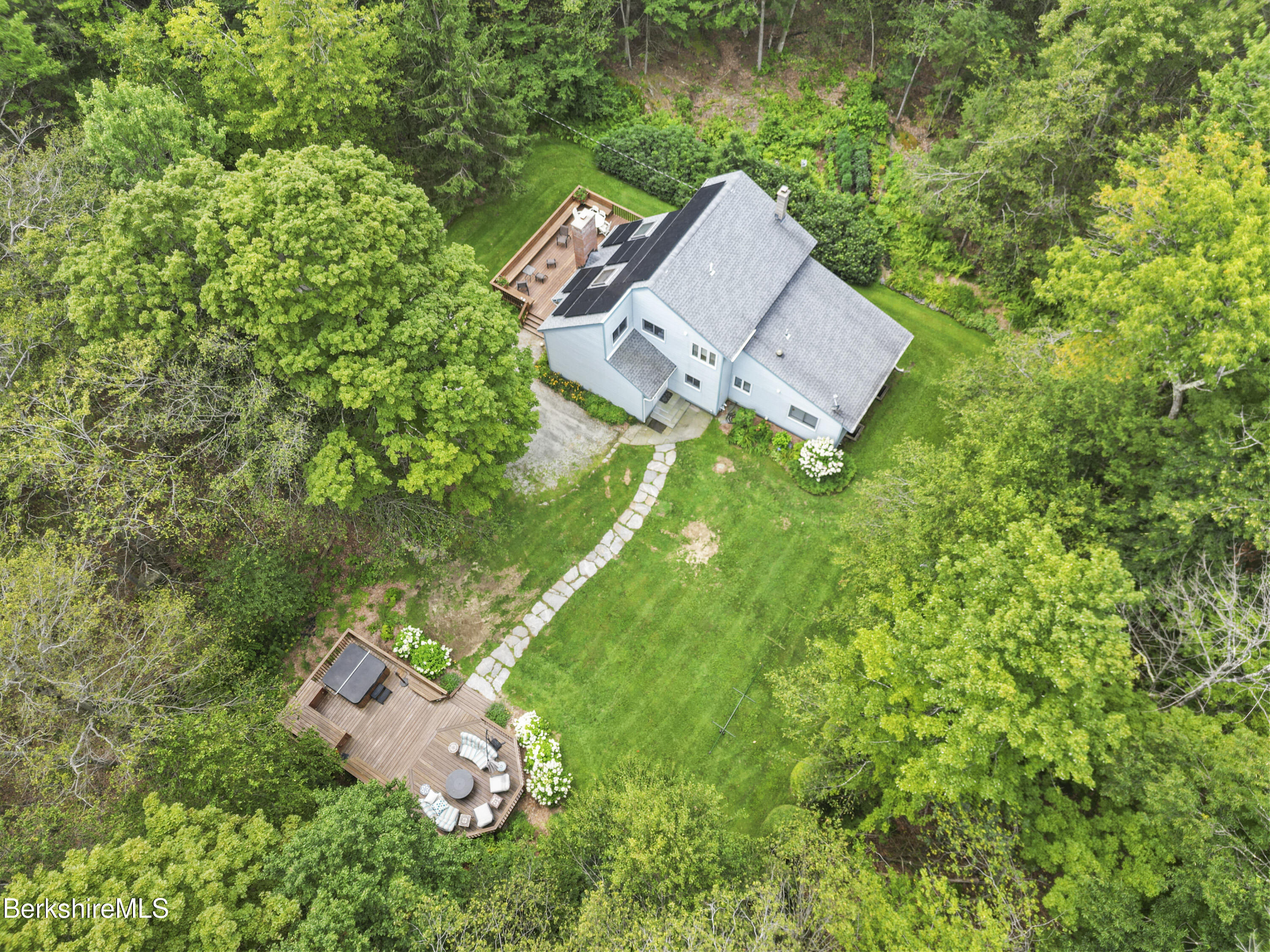 337 Captain Whitney Road Becket, MA 01223 - Photo 53 of 53 an aerial view of a house with a yard