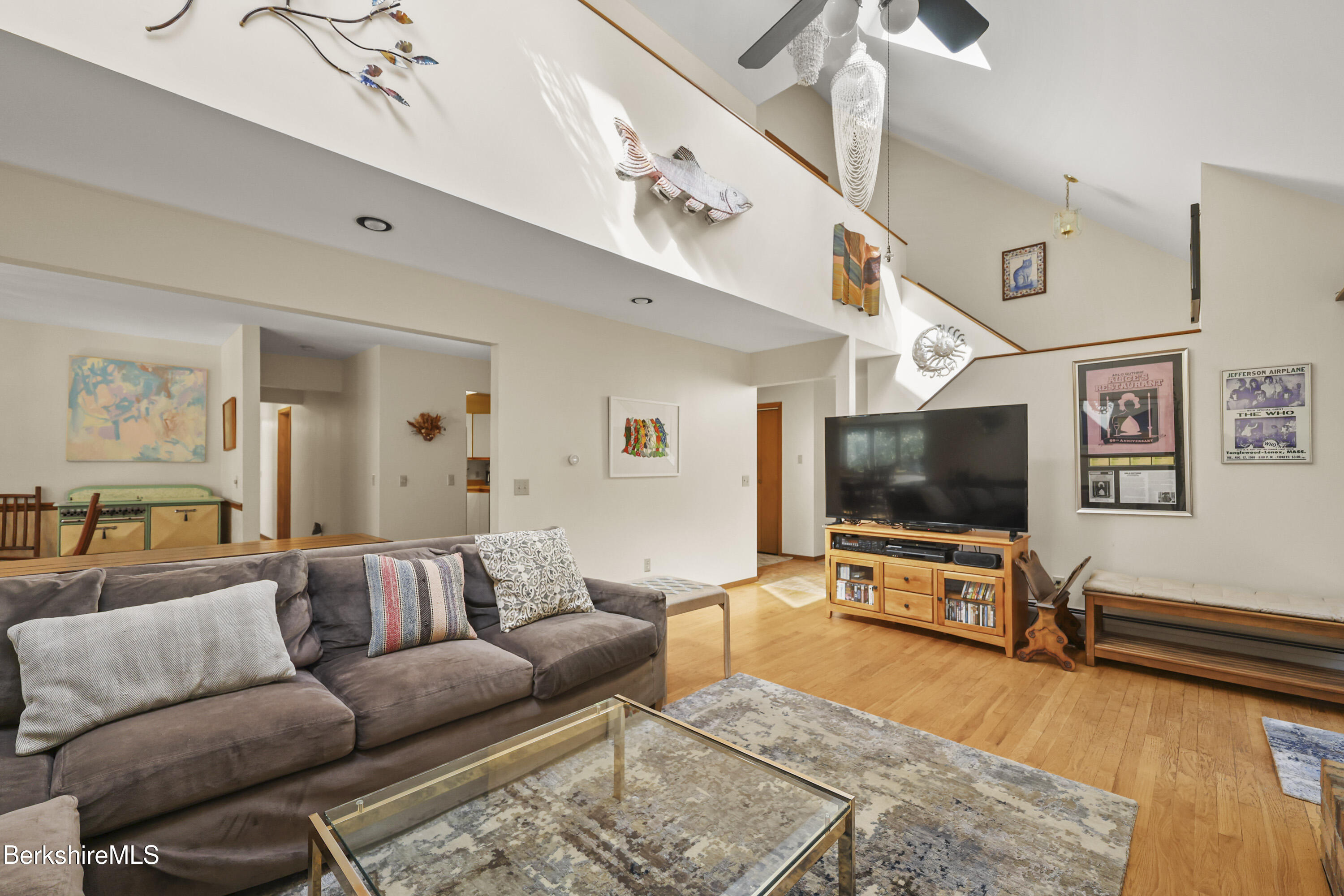 337 Captain Whitney Road Becket, MA 01223 - Photo 9 of 53 a living room with furniture and a flat screen tv