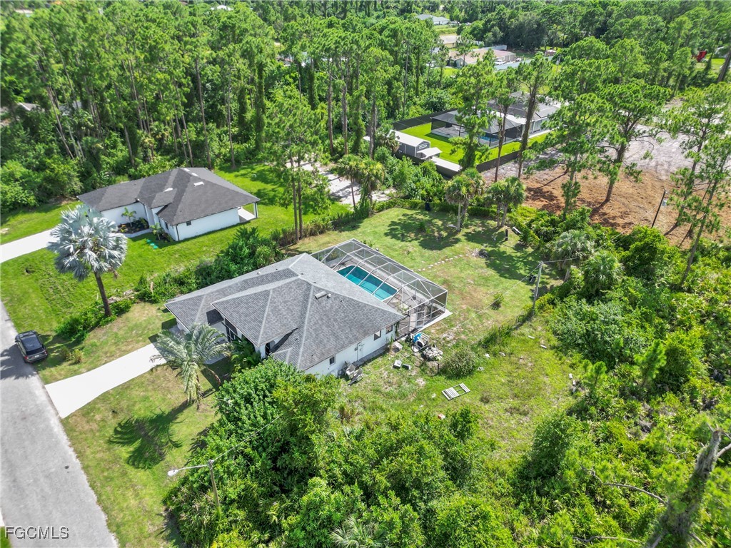 809 Hamilton Avenue Lehigh Acres, FL 33972 - Photo 15 of 25 a view of a house with a yard