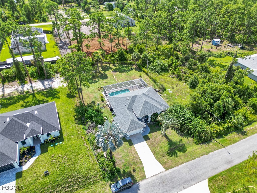809 Hamilton Avenue Lehigh Acres, FL 33972 - Photo 16 of 25 an aerial view of residential house with outdoor space