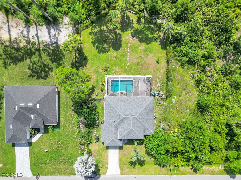 809 Hamilton Avenue Lehigh Acres, FL 33972 - Photo 24 of 25 an aerial view of a house