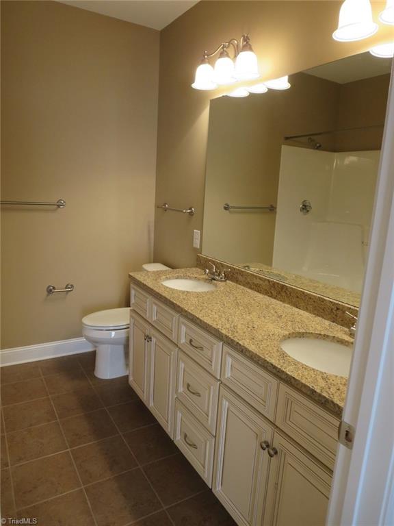 2022 Springwood Road Asheboro, NC 27205 - Photo 12 of 20 Master Bath - Double Vanity with Granite Countertop, Ceramic Tile Floor