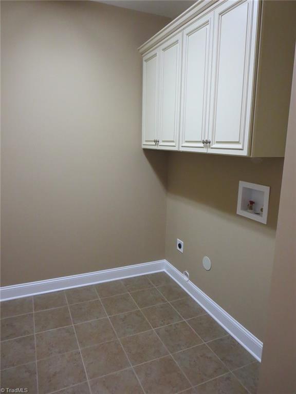 2022 Springwood Road Asheboro, NC 27205 - Photo 10 of 20 Laundry Room - Cabinet Storage