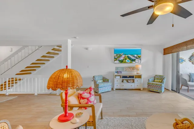a kitchen with refrigerator cabinets and wooden floor