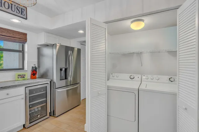 a bedroom with a bed and ceiling fan